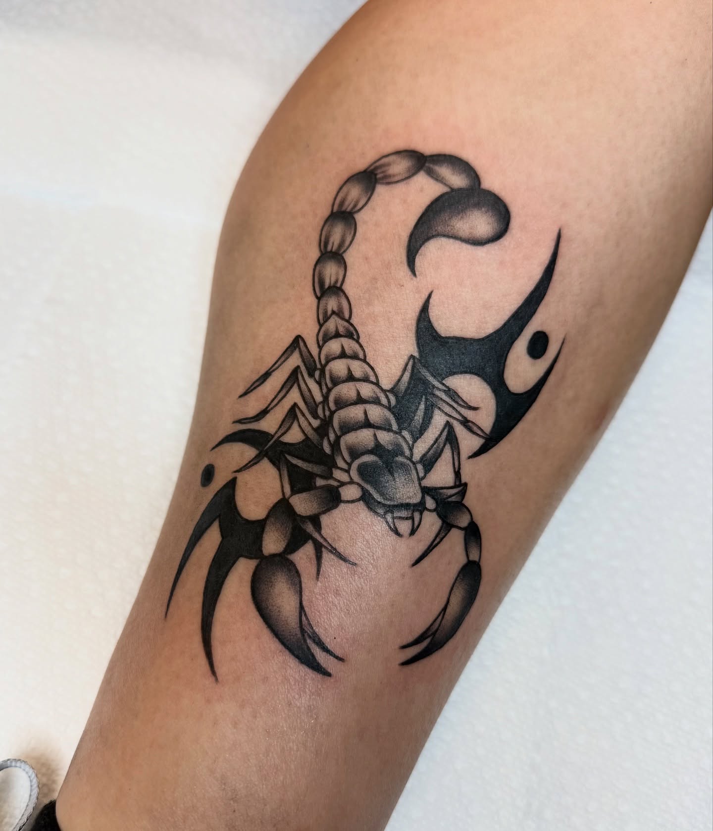 Scorpion geometric tattoo on the forearm by dinah