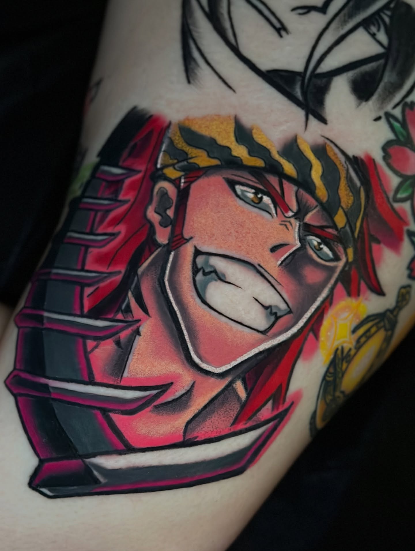 Anime character anime tattoo on the forearm by Jeremy Thomas