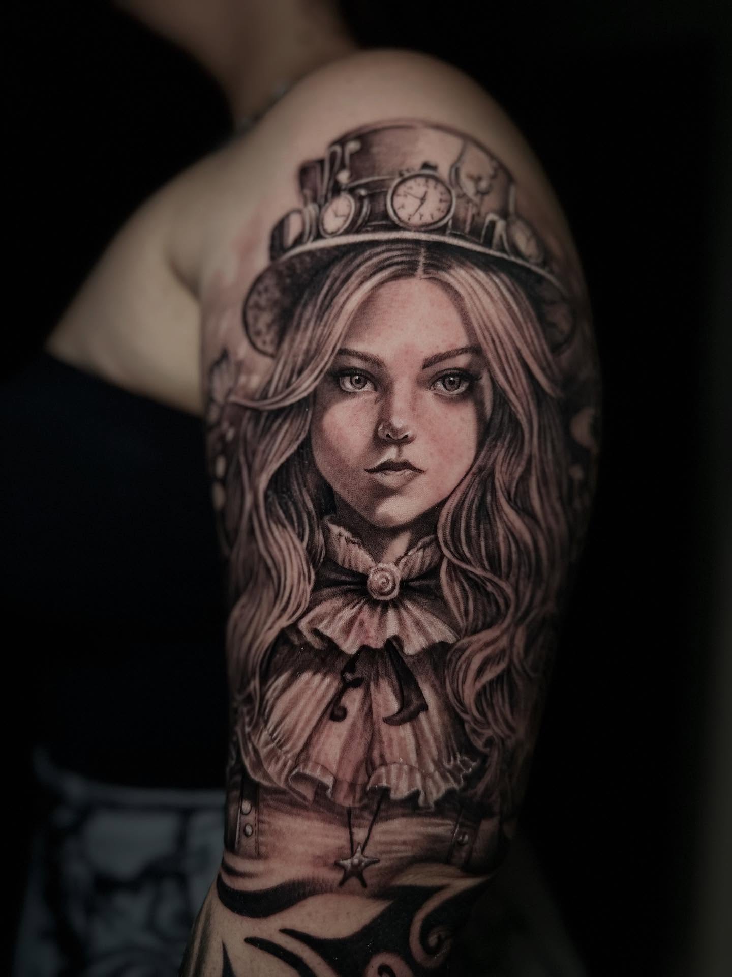 Alice in wonderland realism tattoo on the forearm by El Bryan Tattoos
