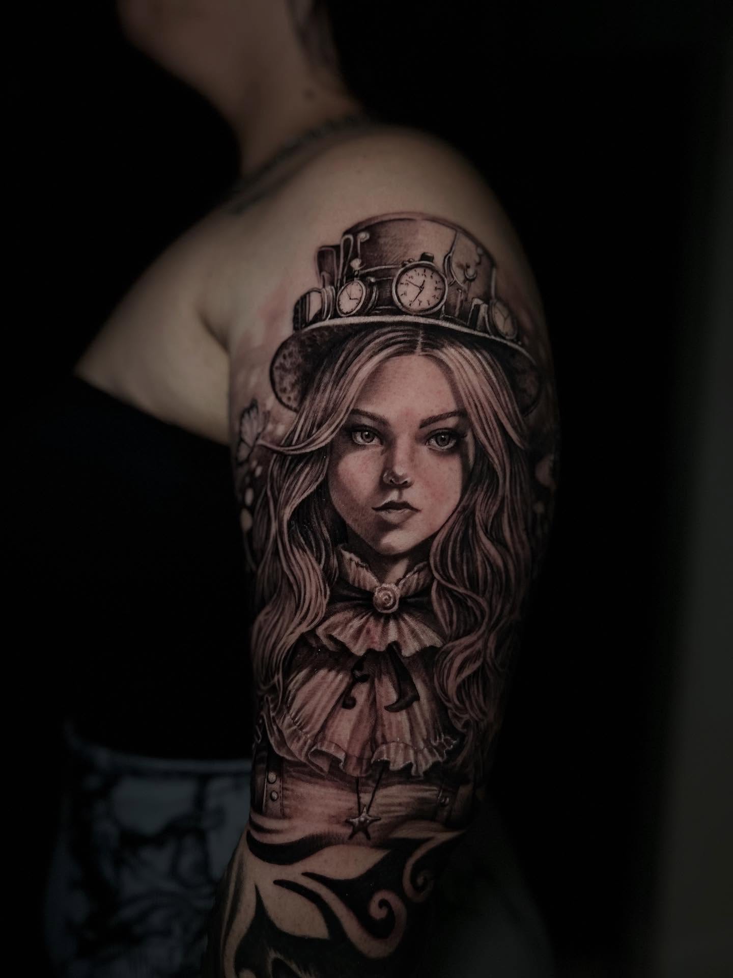 Alice in wonderland realism tattoo on the forearm by El Bryan Tattoos