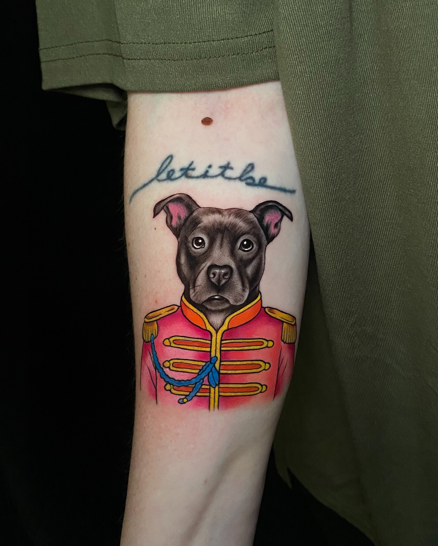 Dog in military uniform realism tattoo on the forearm by Pablof 🕸️
