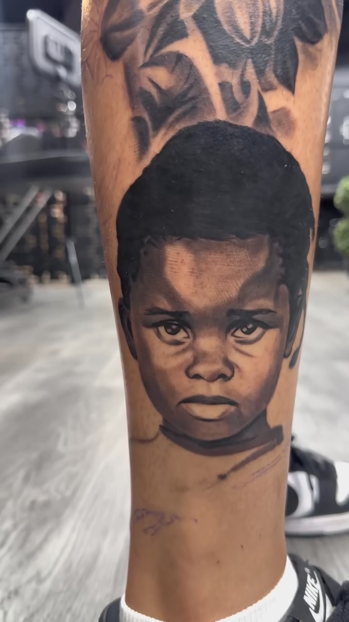 Tattoo by @dontaviousdavis_ — realism, black_and_grey