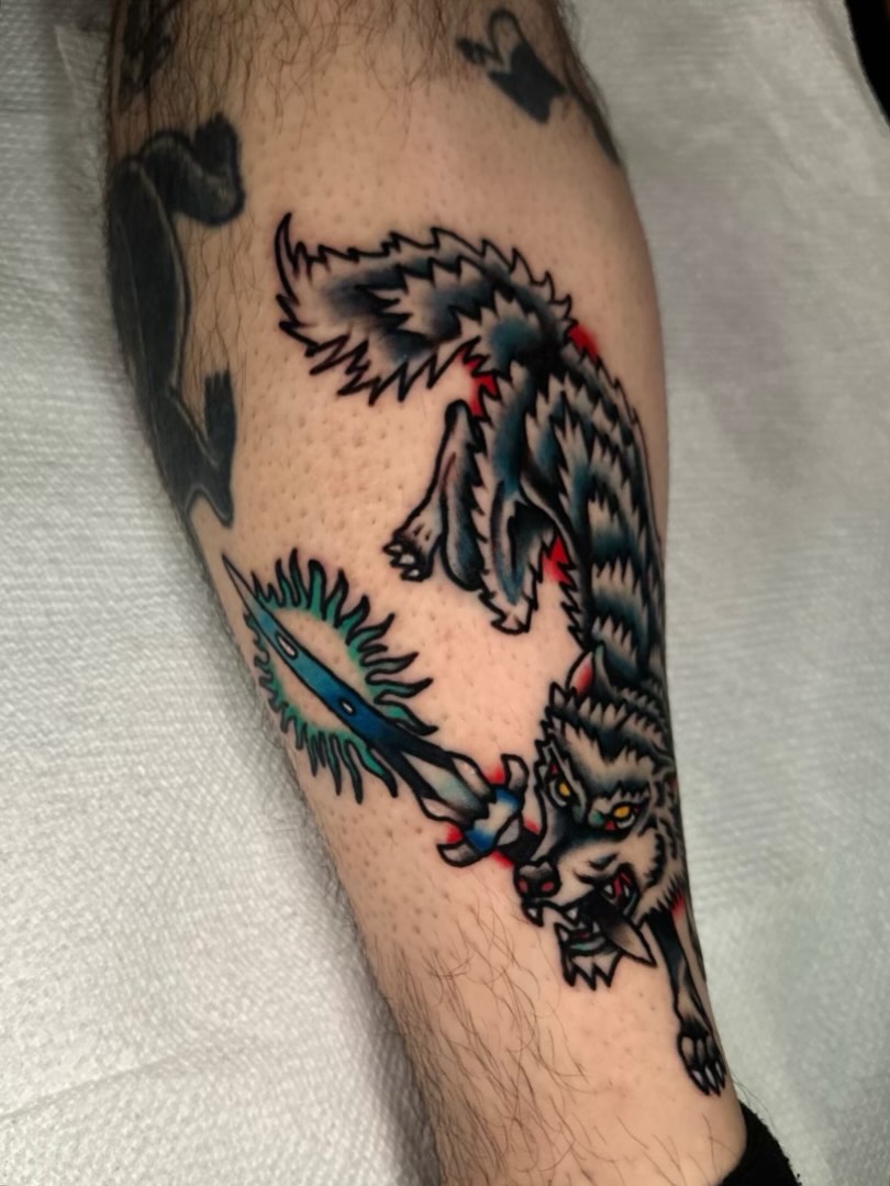 Wolf American traditional tattoo on the forearm by Brooke