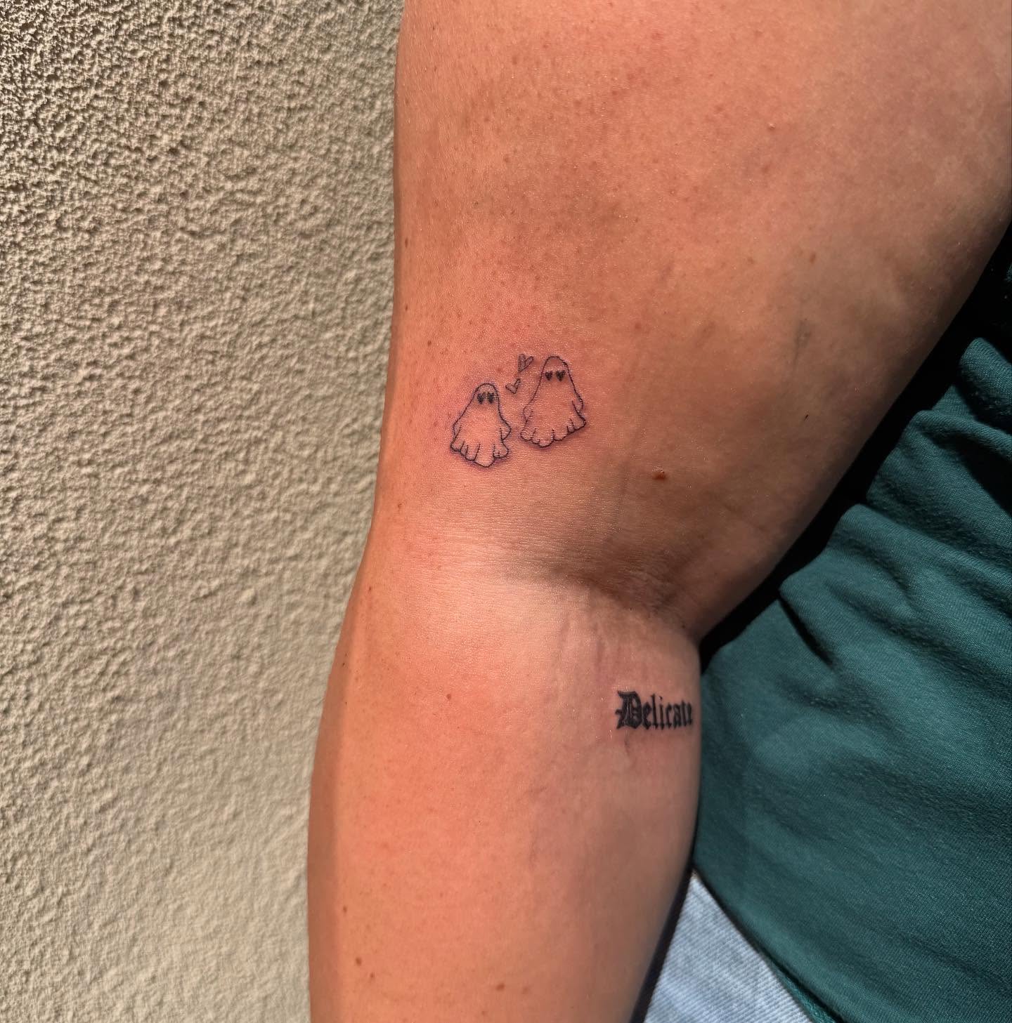 Ghosts dotwork tattoo on the forearm by Kylee Snow