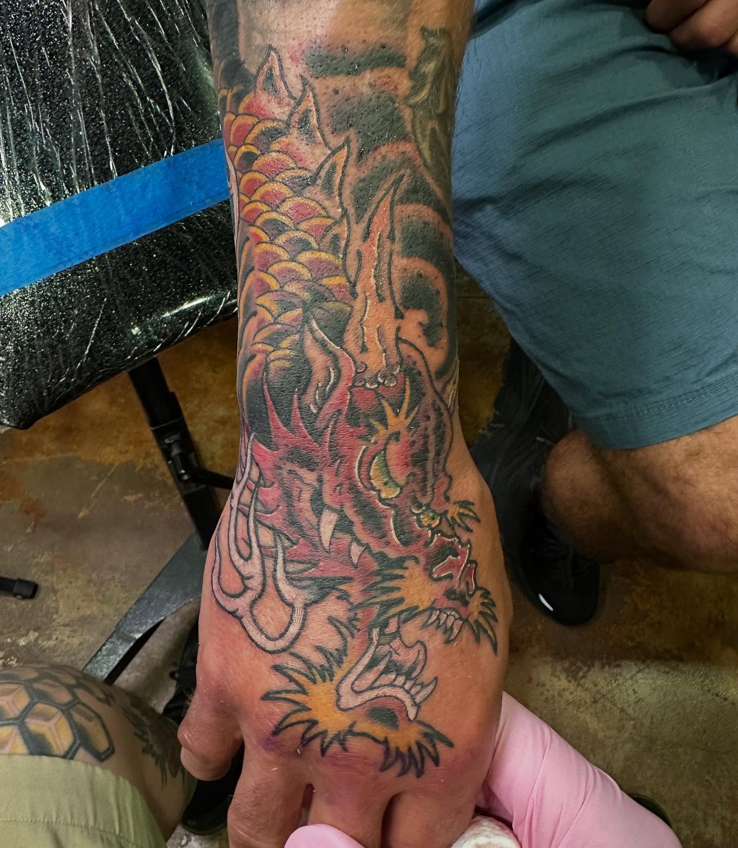 Dragon Japanese tattoo on the forearm by Wesley Lam