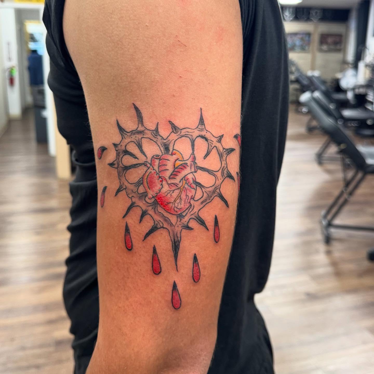 Heart with thorns neo-traditional tattoo on the forearm by LeLe