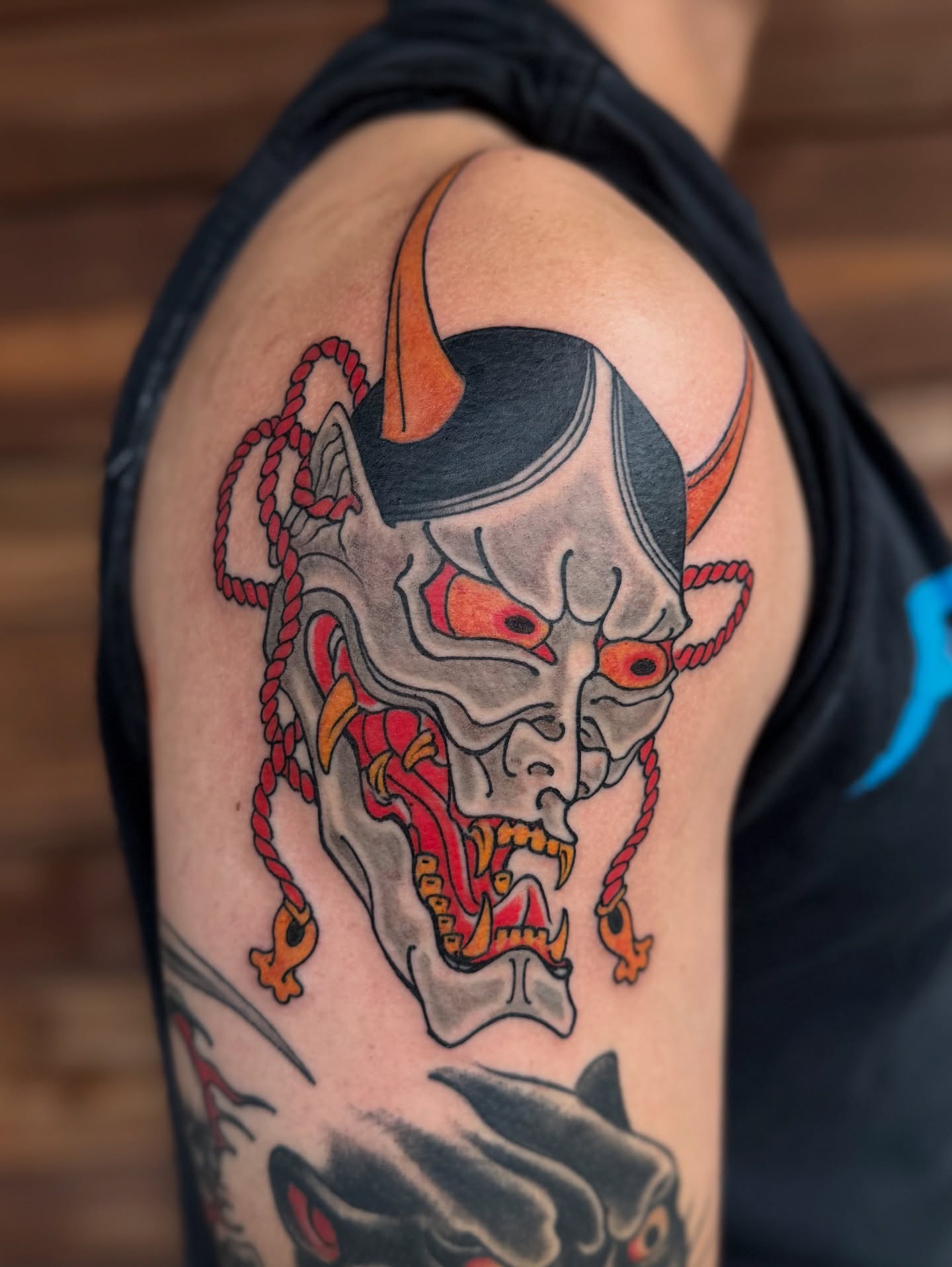 Demon mask japanese irezumi tattoo on the shoulder by Scott Kulikowski
