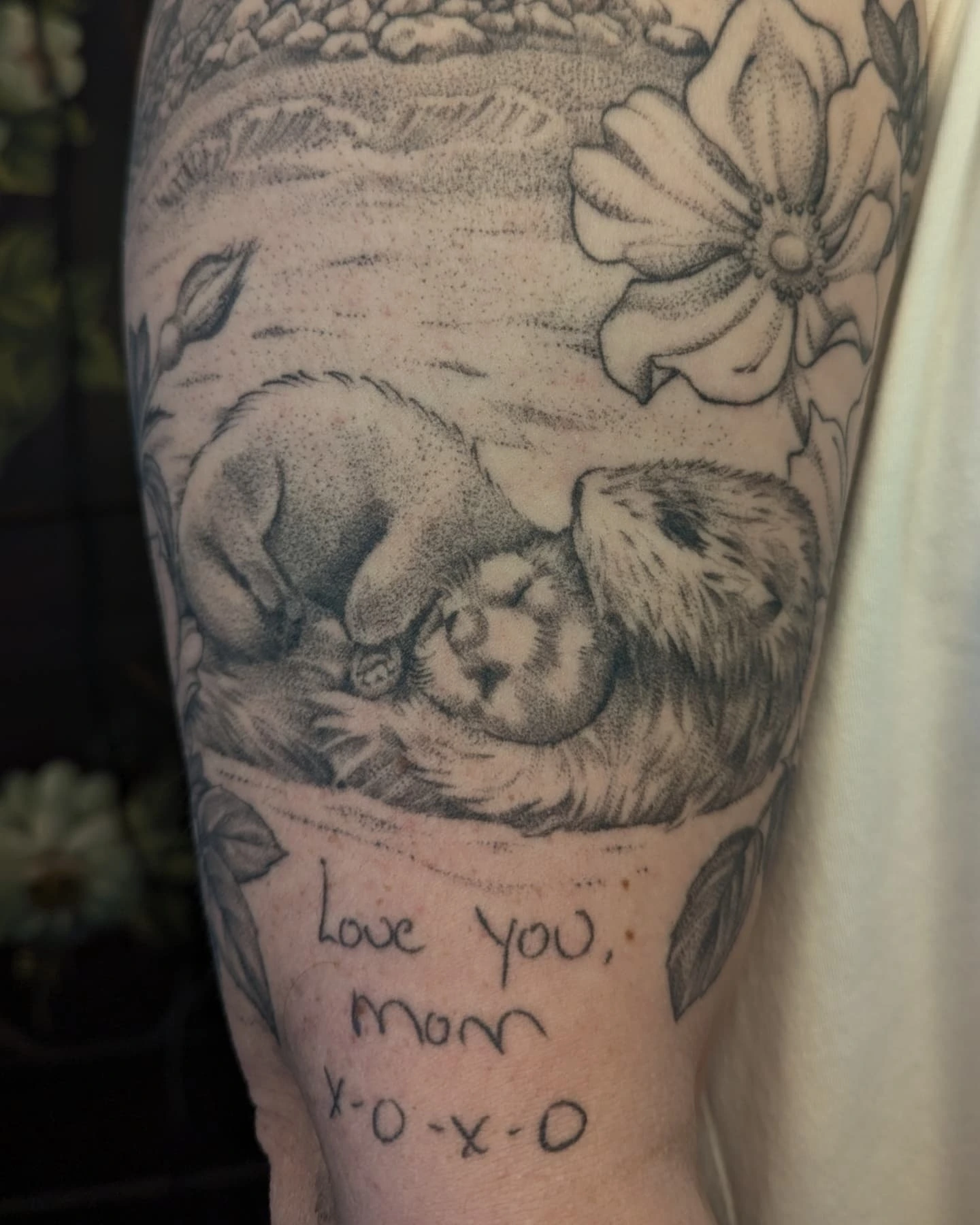 Sleeping dog dotwork tattoo on the forearm by Jeanine, Providence, Rhode Island