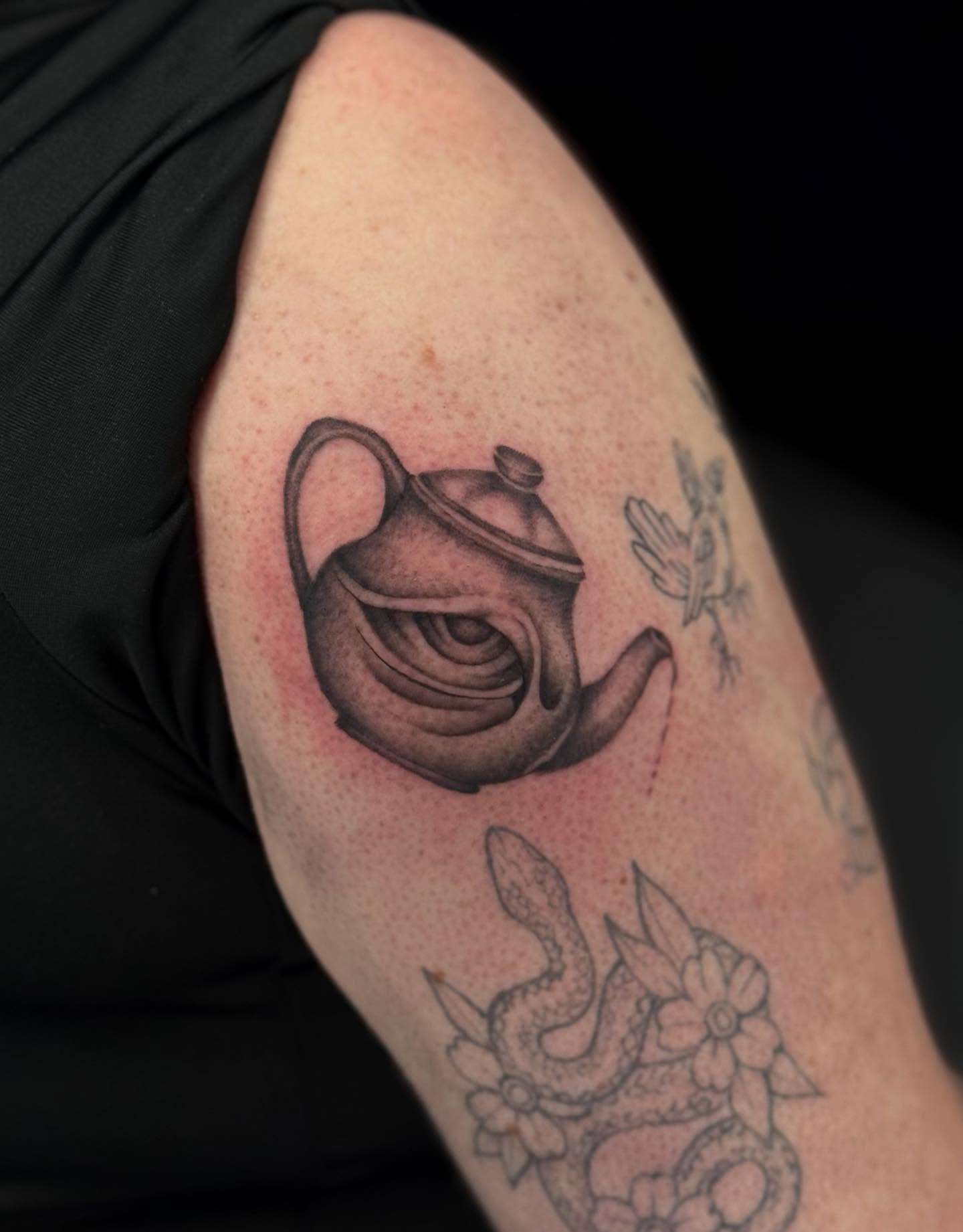 Teapot black and grey tattoo on the forearm by Alexa Camacho