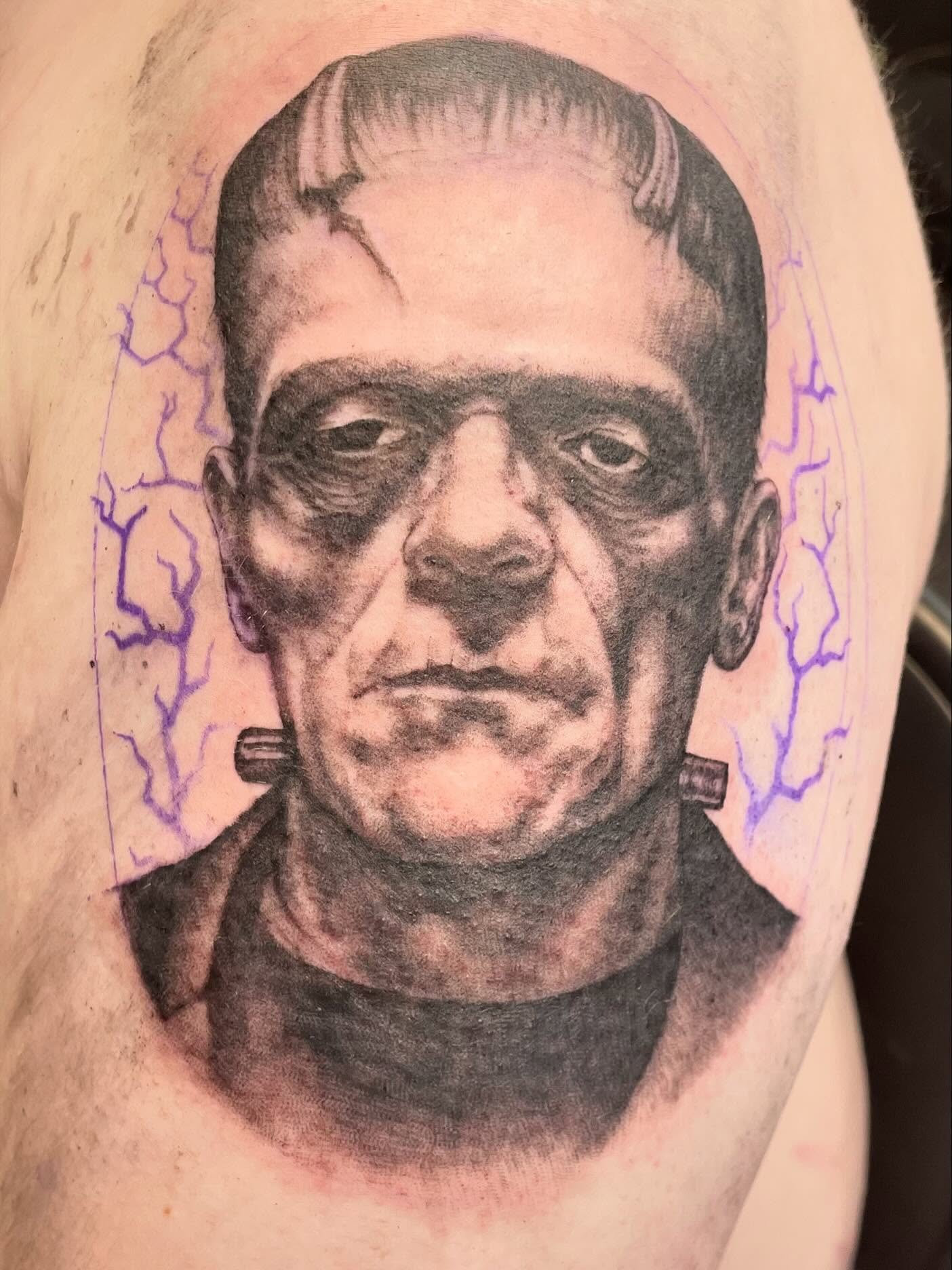 Frankenstein realism tattoo on the upper arm by Christin Baumgart