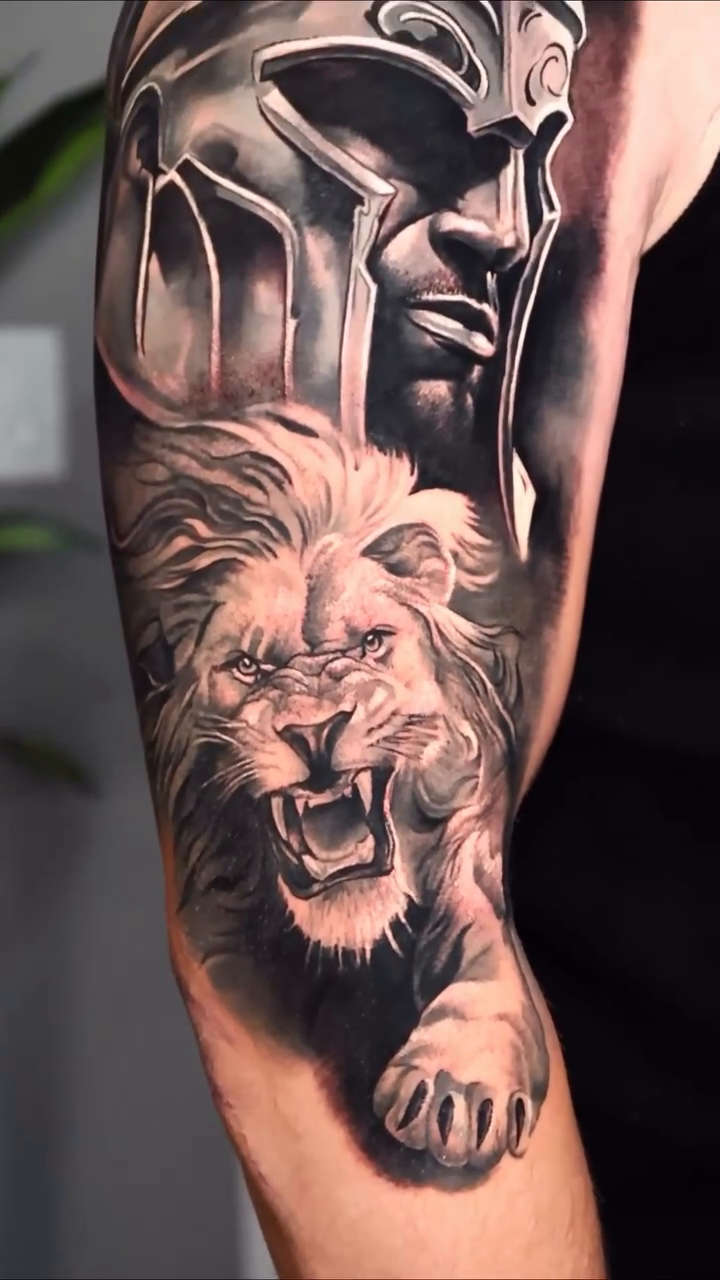 Spartan helmet and lion realism tattoo by Ali Saleh 🇱🇧 Detroit Tattoo Artist, Dearborn, Michigan