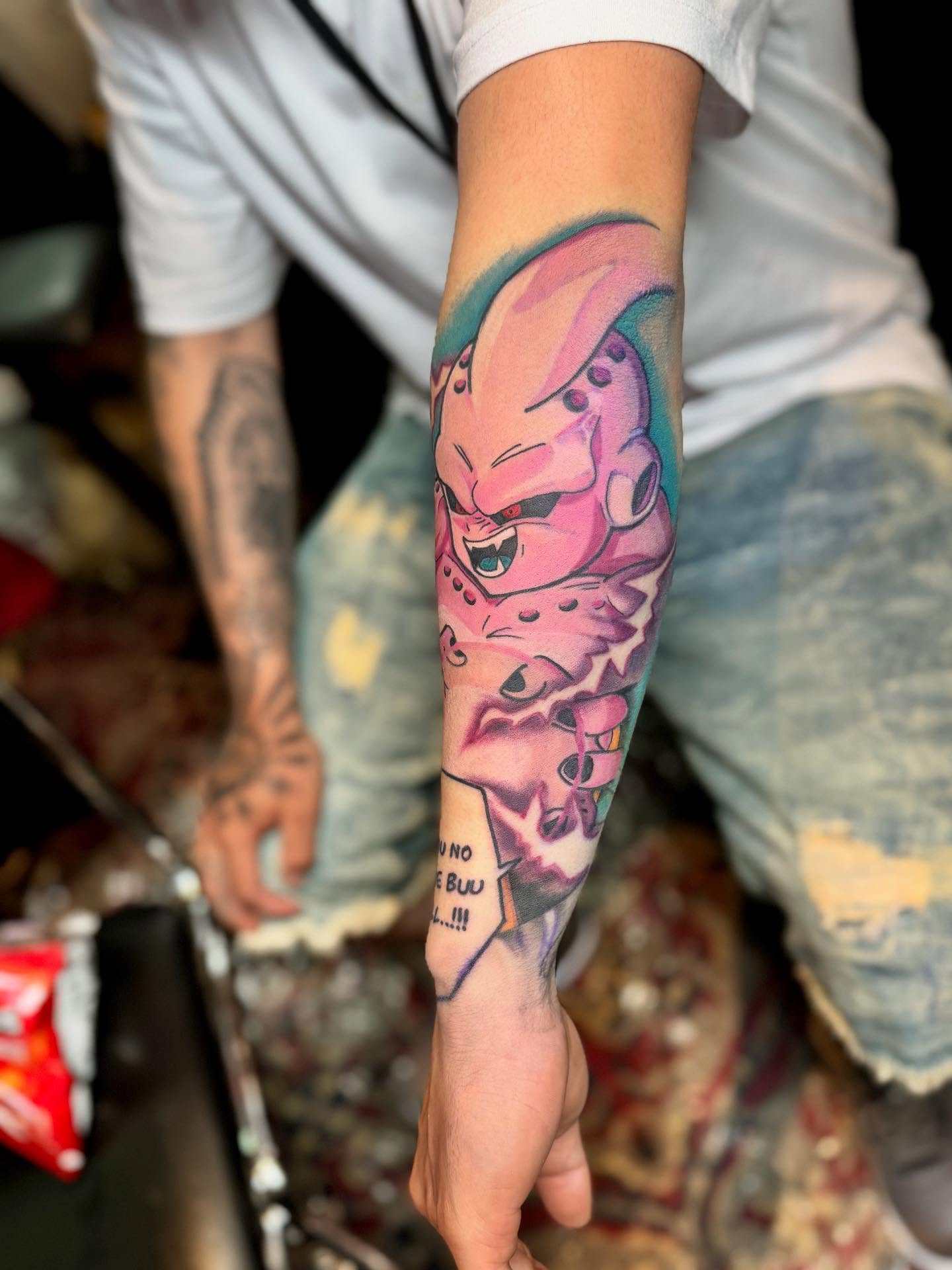 Dragon ball character anime tattoo on the forearm by Stephanie Cruz, Kansas City, Missouri