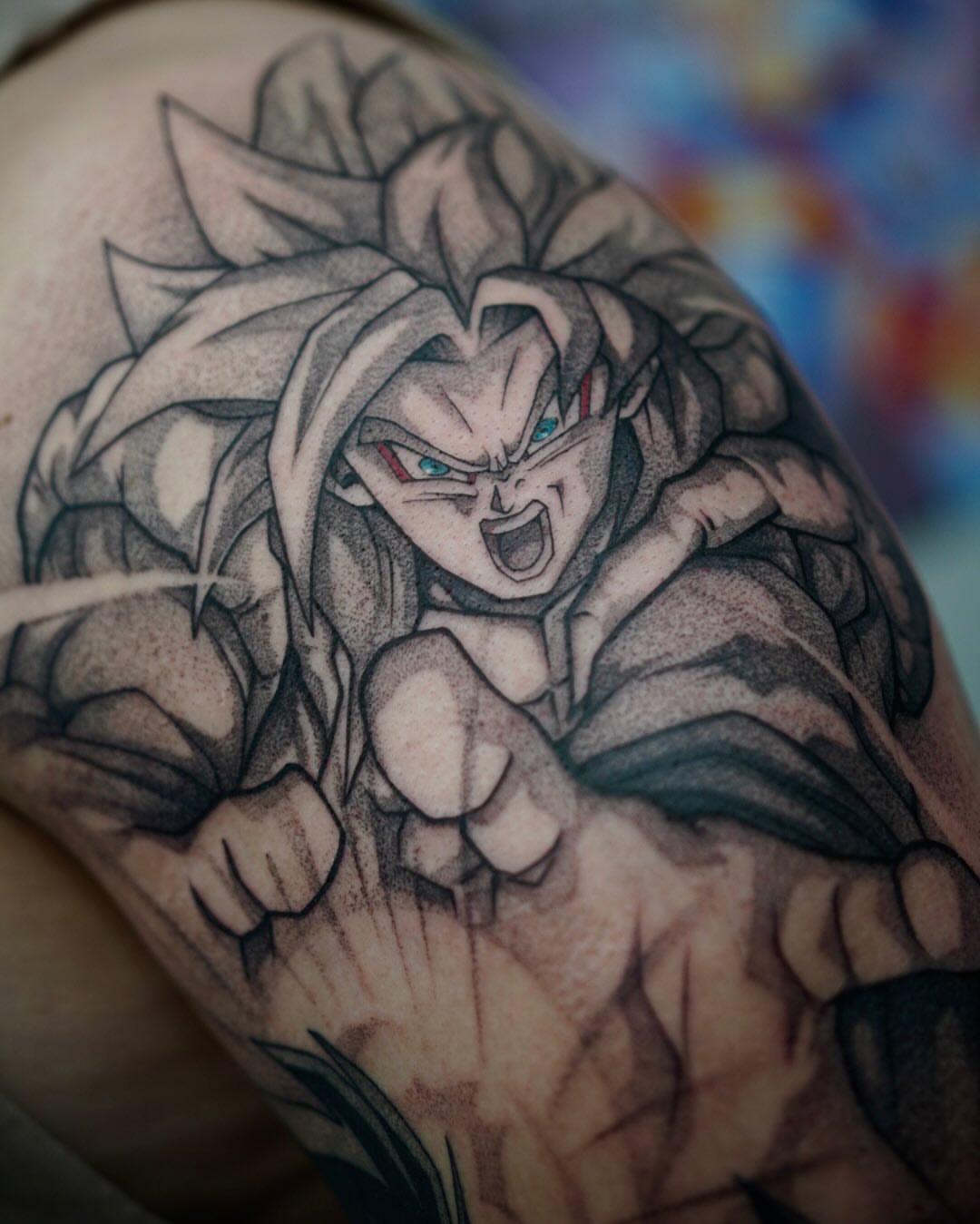 Super saiyan anime tattoo on the shoulder by Angel Rodriguez