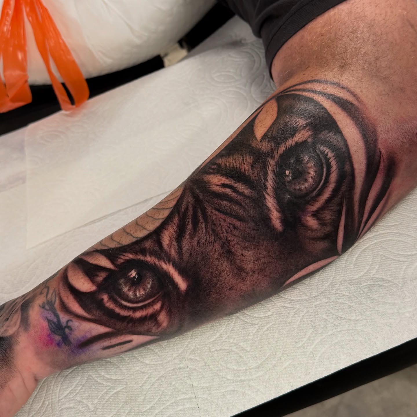 Eye realism tattoo on the forearm by Grace P