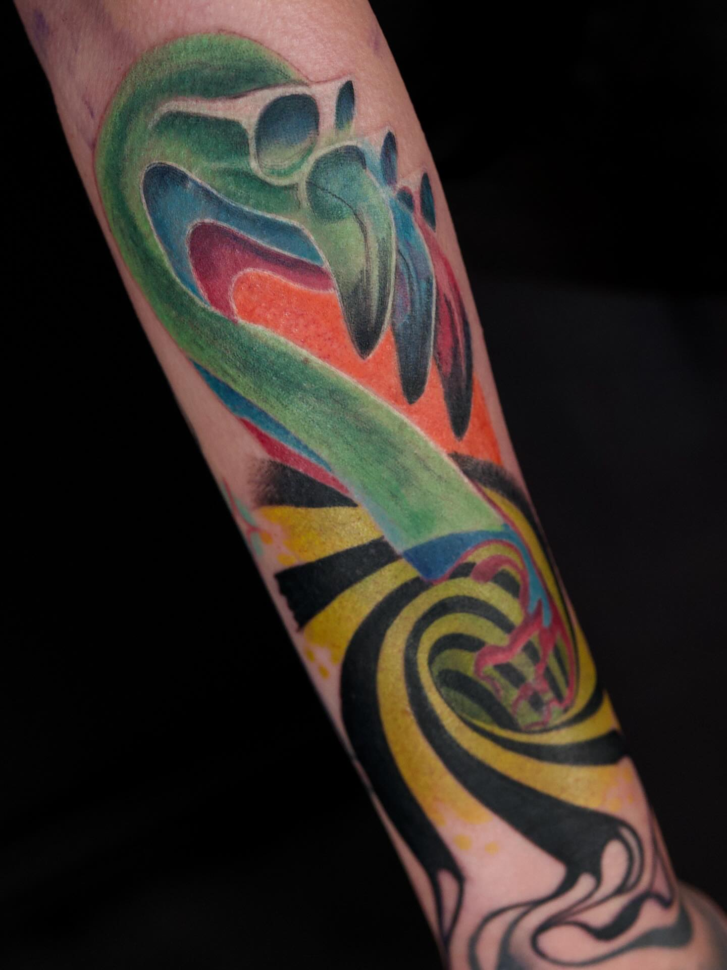 Abstract design new school tattoo on the forearm by Chris Lochbihler