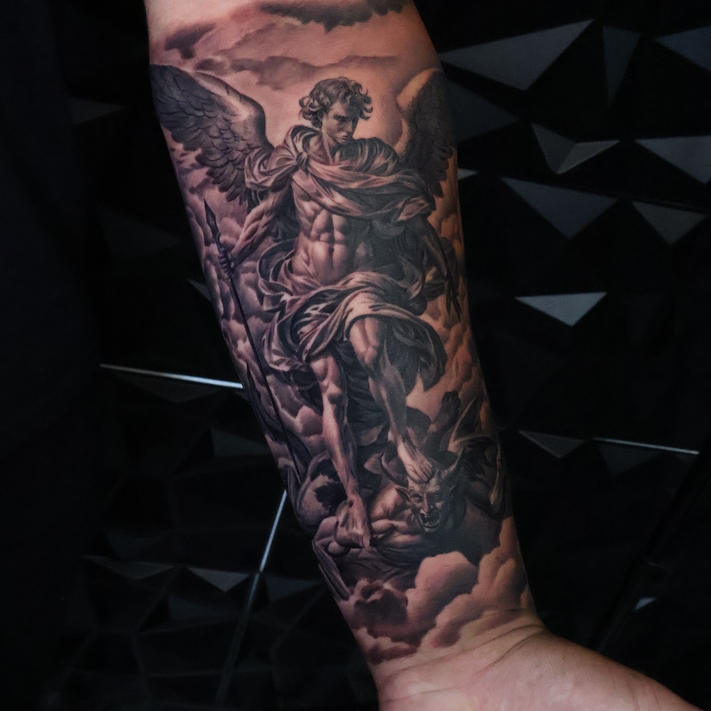 Angelic figure realism tattoo on the forearm by Angels tattoo
