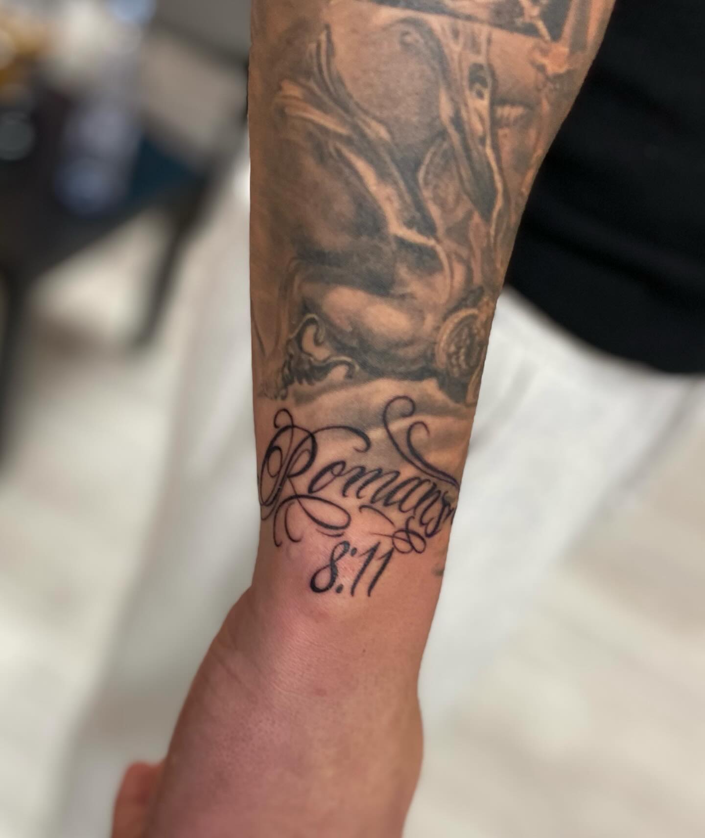 Script lettering lettering script tattoo on the forearm by Antonio