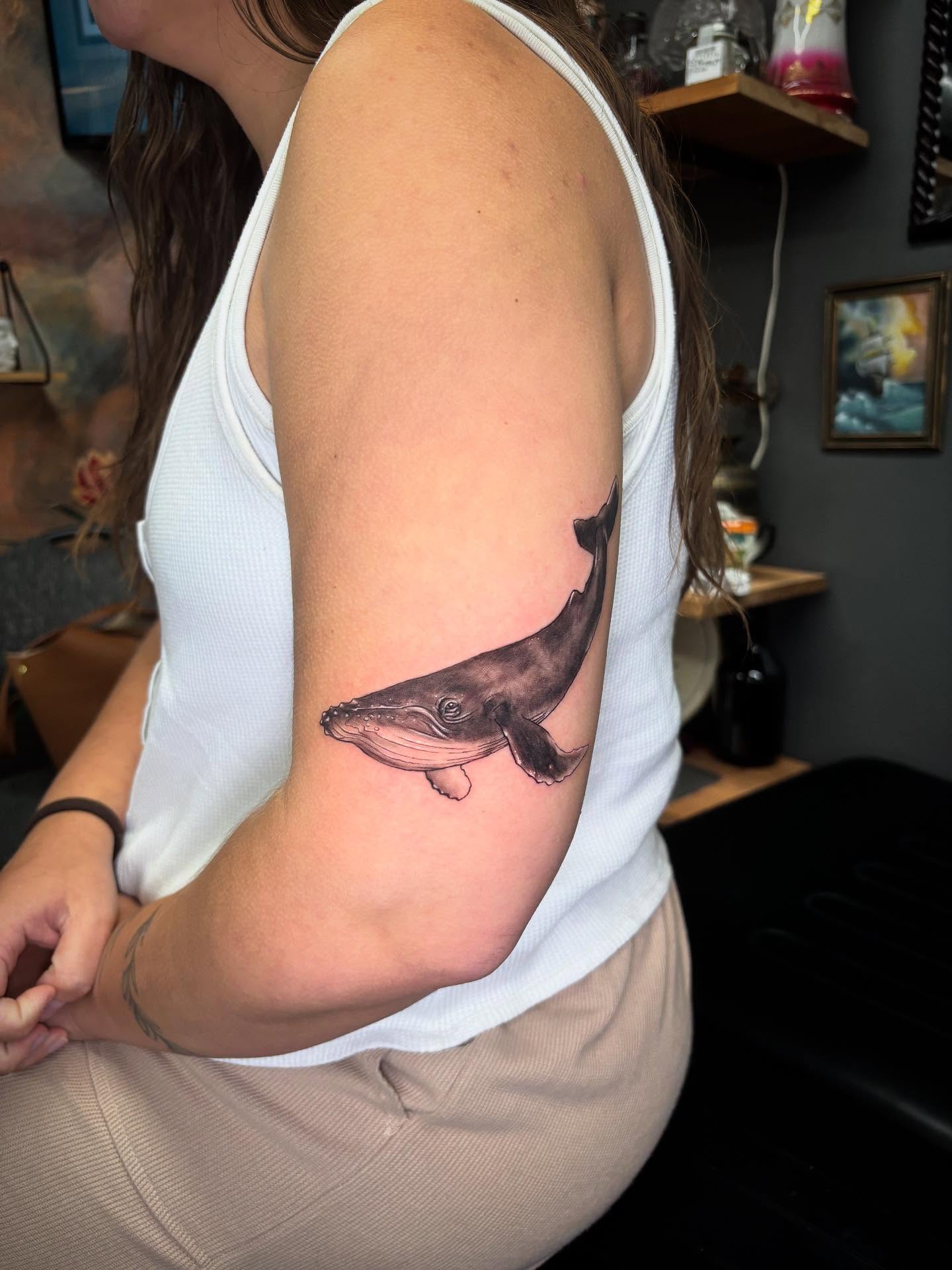 Whale realism tattoo on the forearm by Kayla