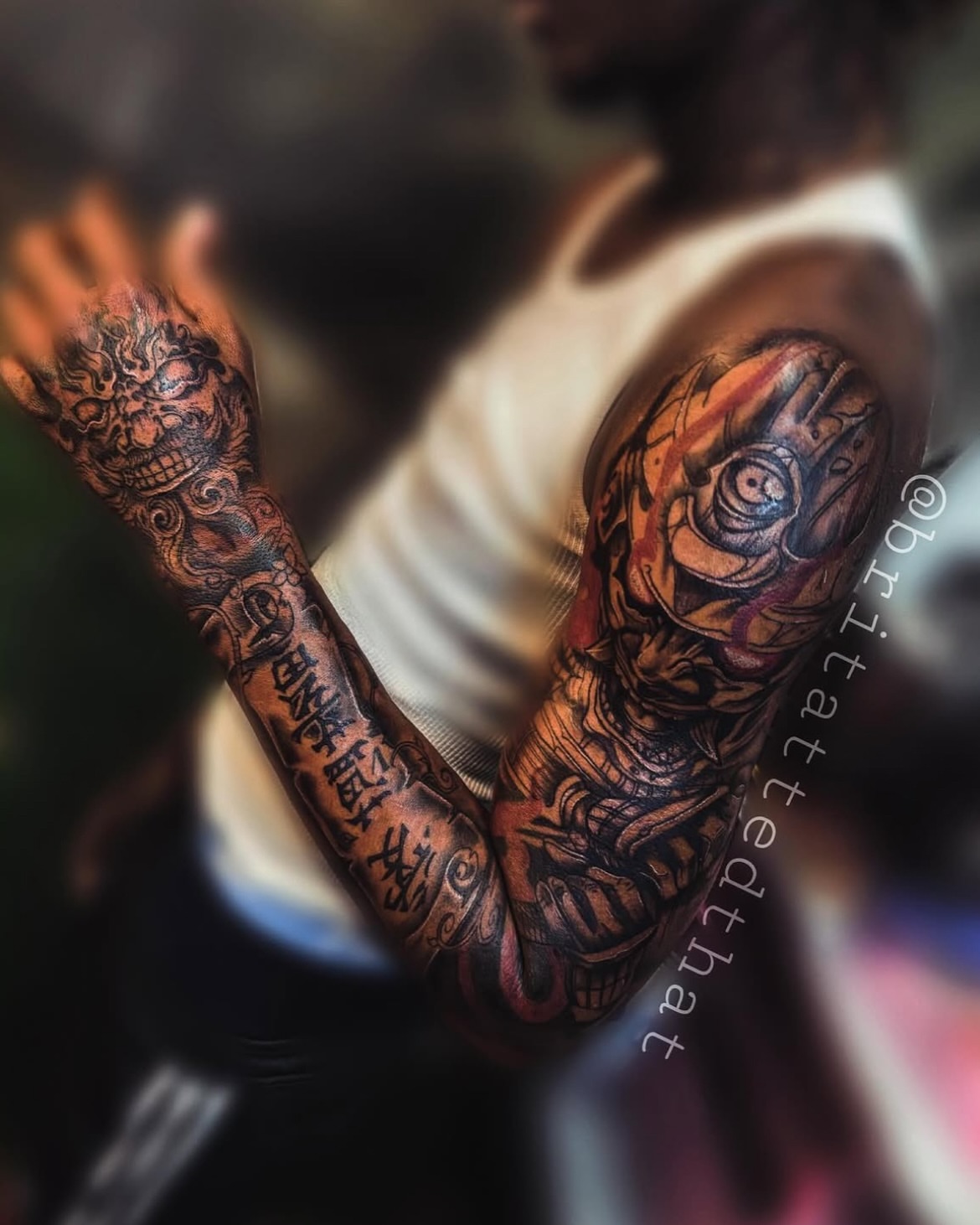 Skull and eye dark realism tattoo on the upper arm by Bri Tatted That