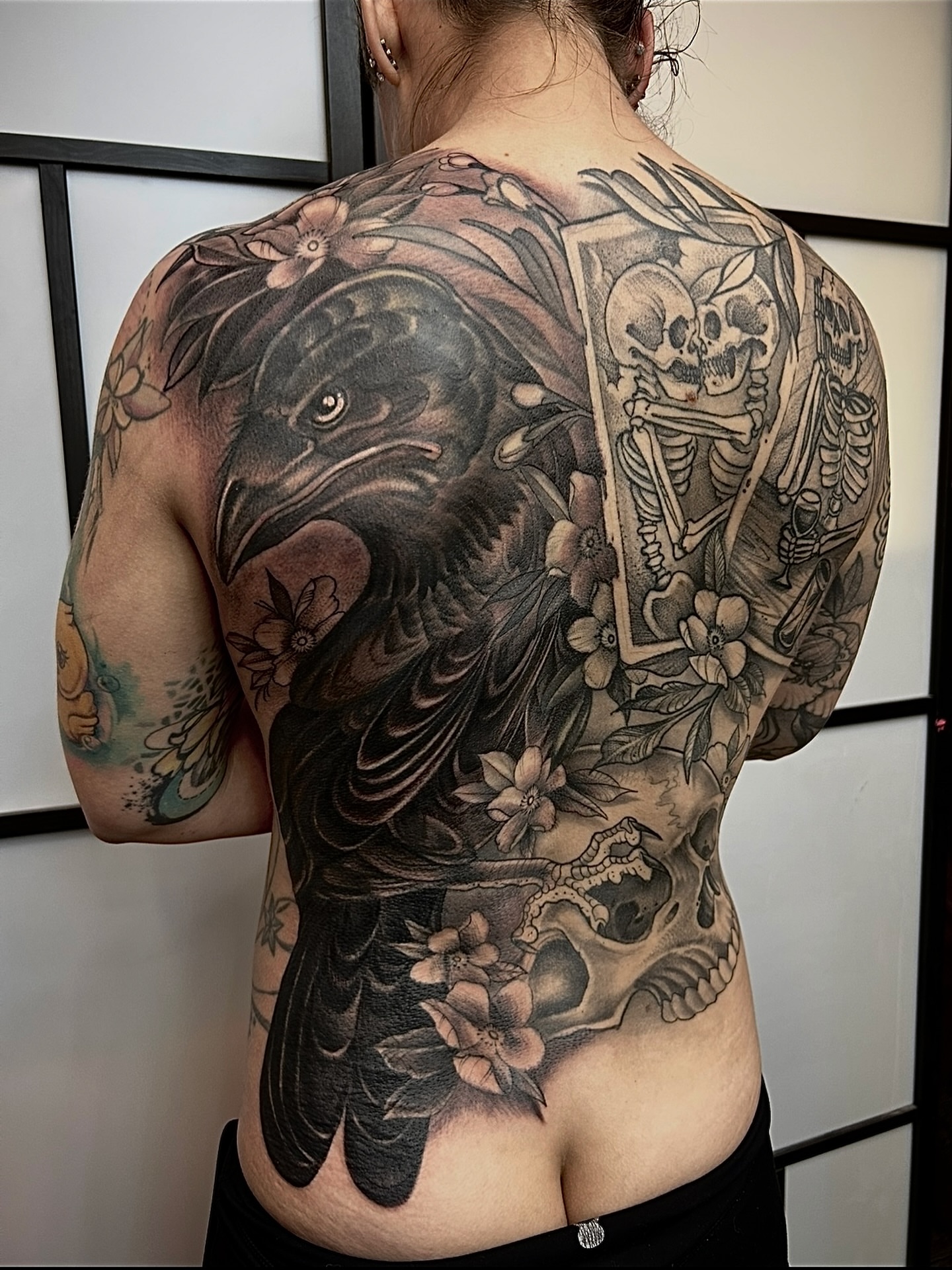 Crow and skull realism tattoo on the back by Ryan Willard, Denver, Colorado