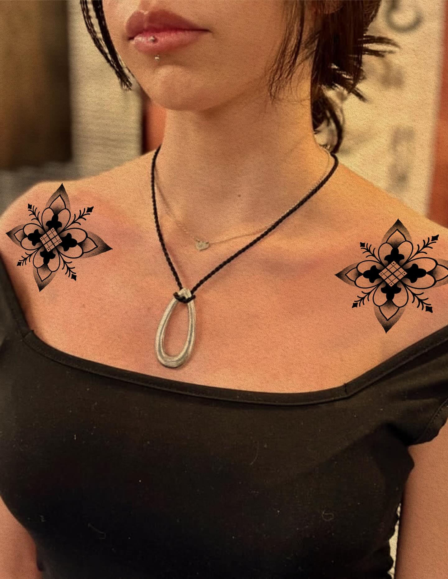 Floral motif ornamental tattoo on the shoulder by Xena