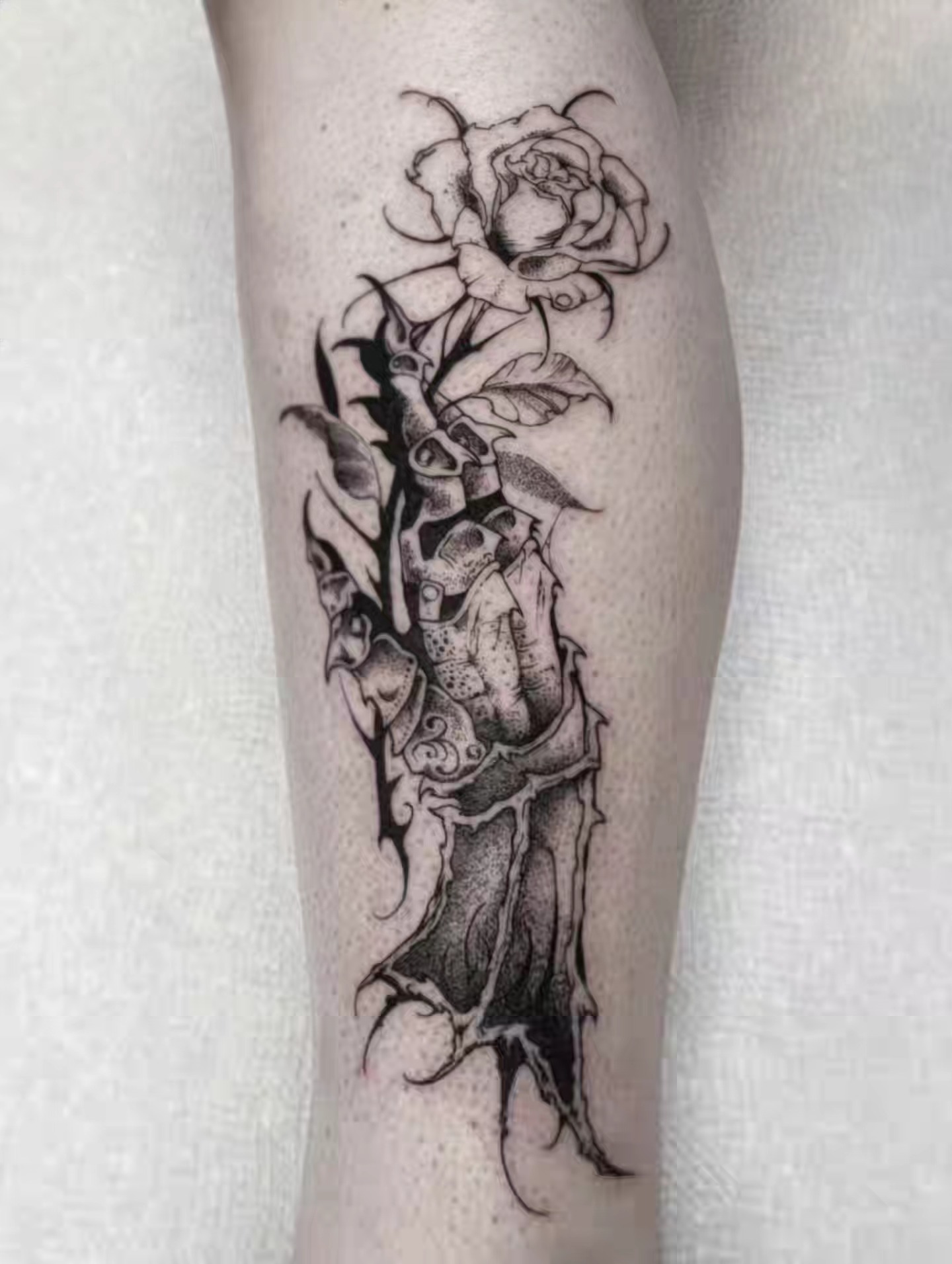 Rose and playing cards dotwork tattoo on the forearm by Luca