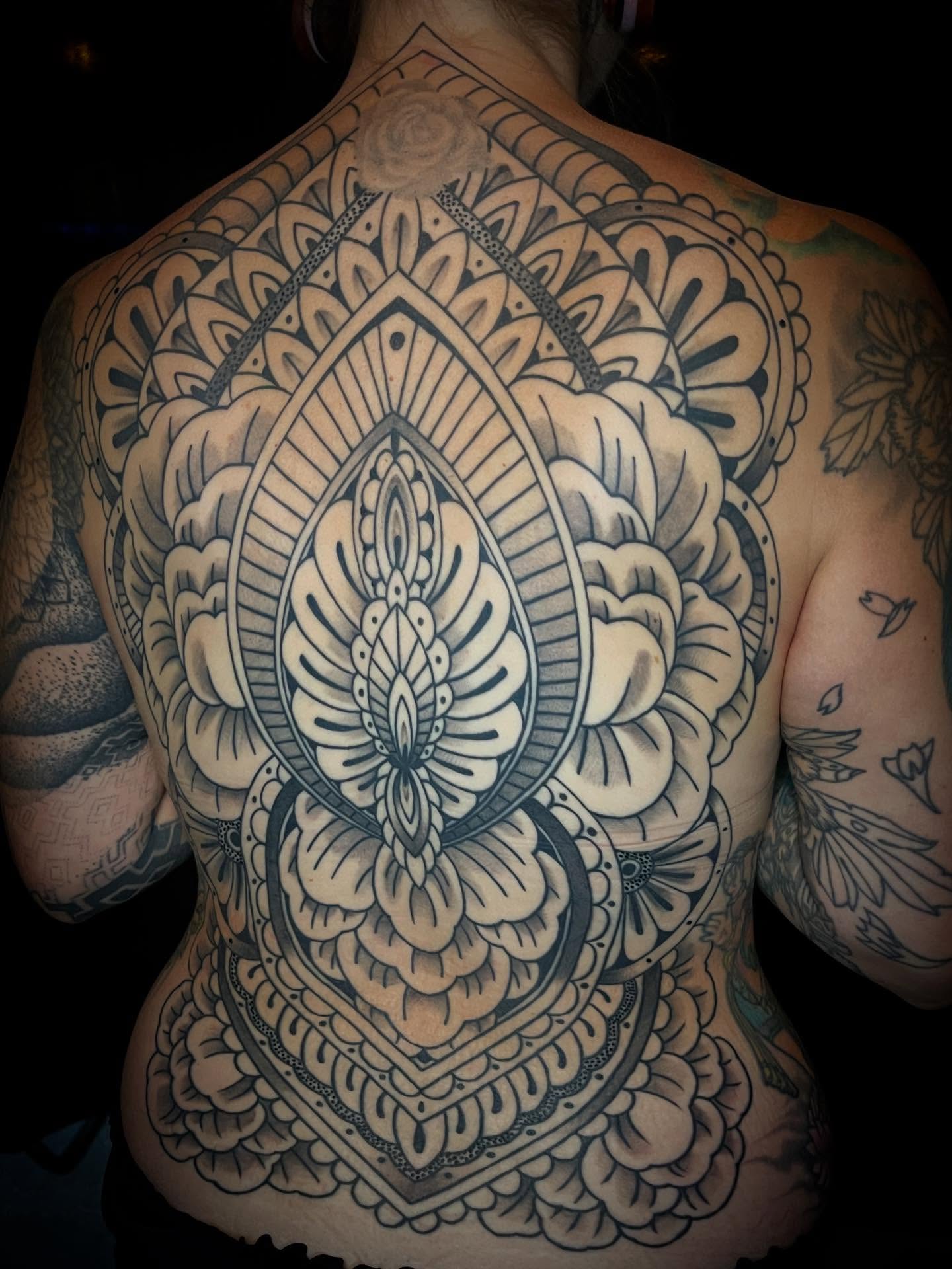 Mandala ornamental tattoo on the back by Jacob Finelli