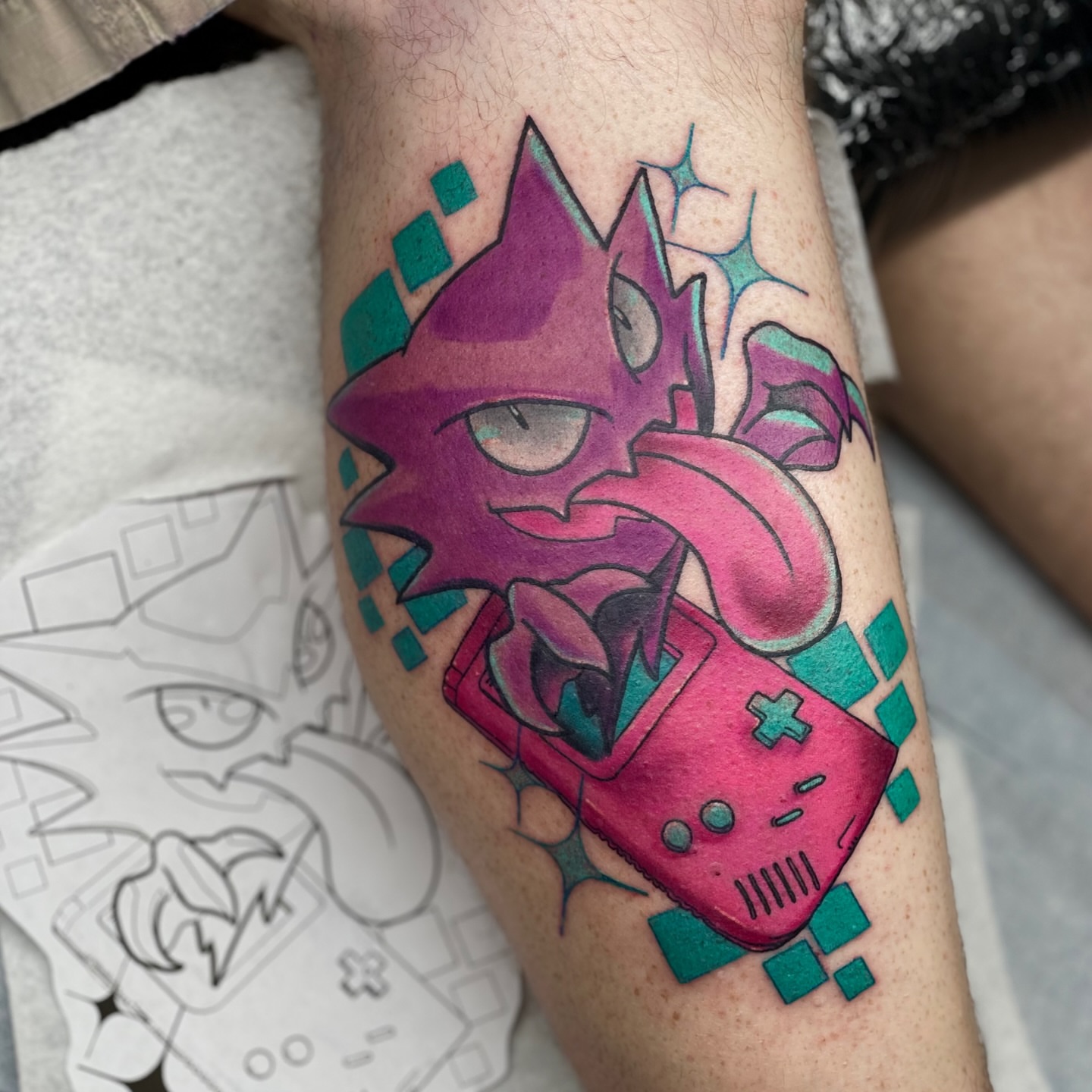 Cat and game controller geometric tattoo on the forearm by ⓒⓨⓡⓤⓢ