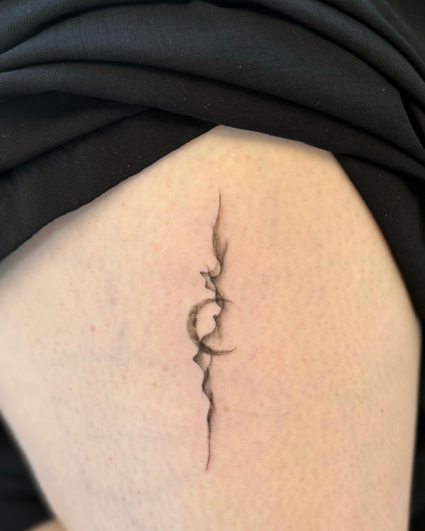 Abstract shape black and grey tattoo on the thigh by David H.