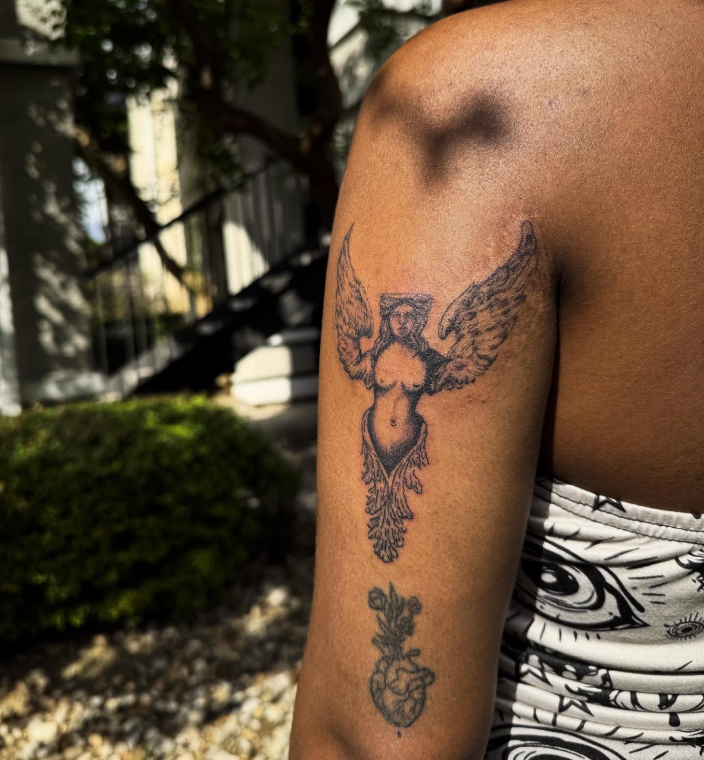 Angel with wings black and grey tattoo on the shoulder by Cullen-Lee