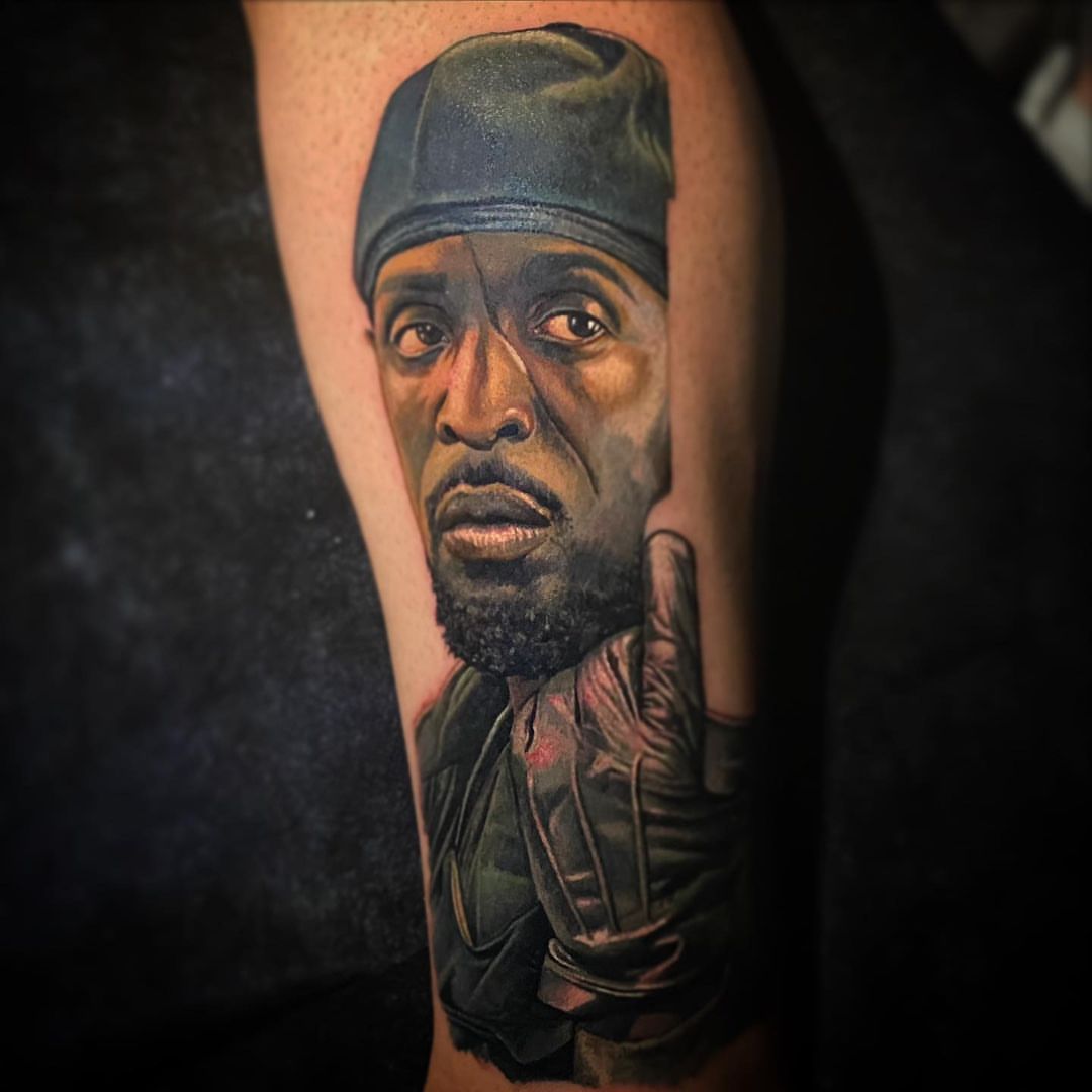 Portrait realism tattoo on the forearm by Carlos Rojas