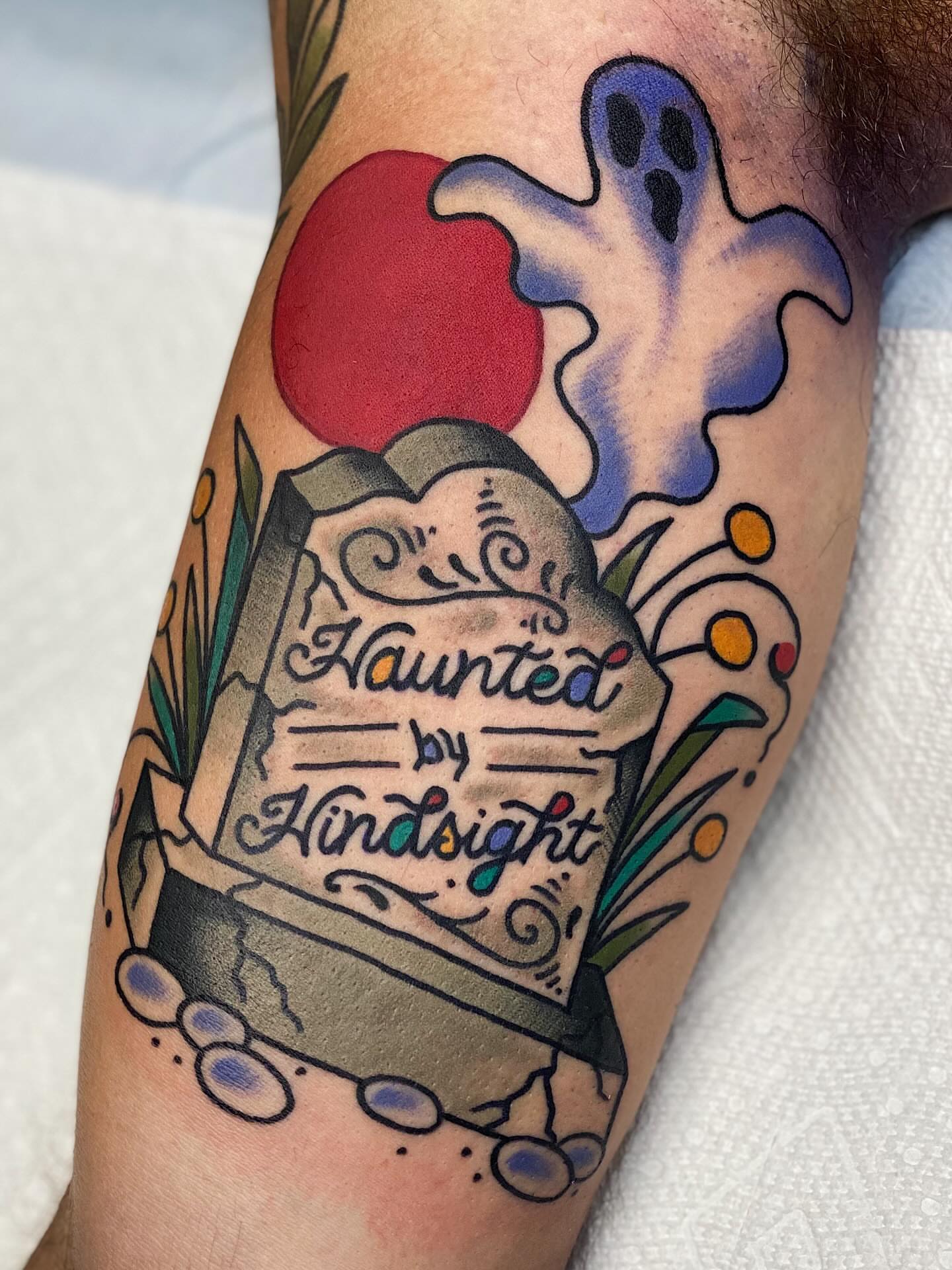 Graveyard with ghost American traditional tattoo on the forearm by Dakota Amato