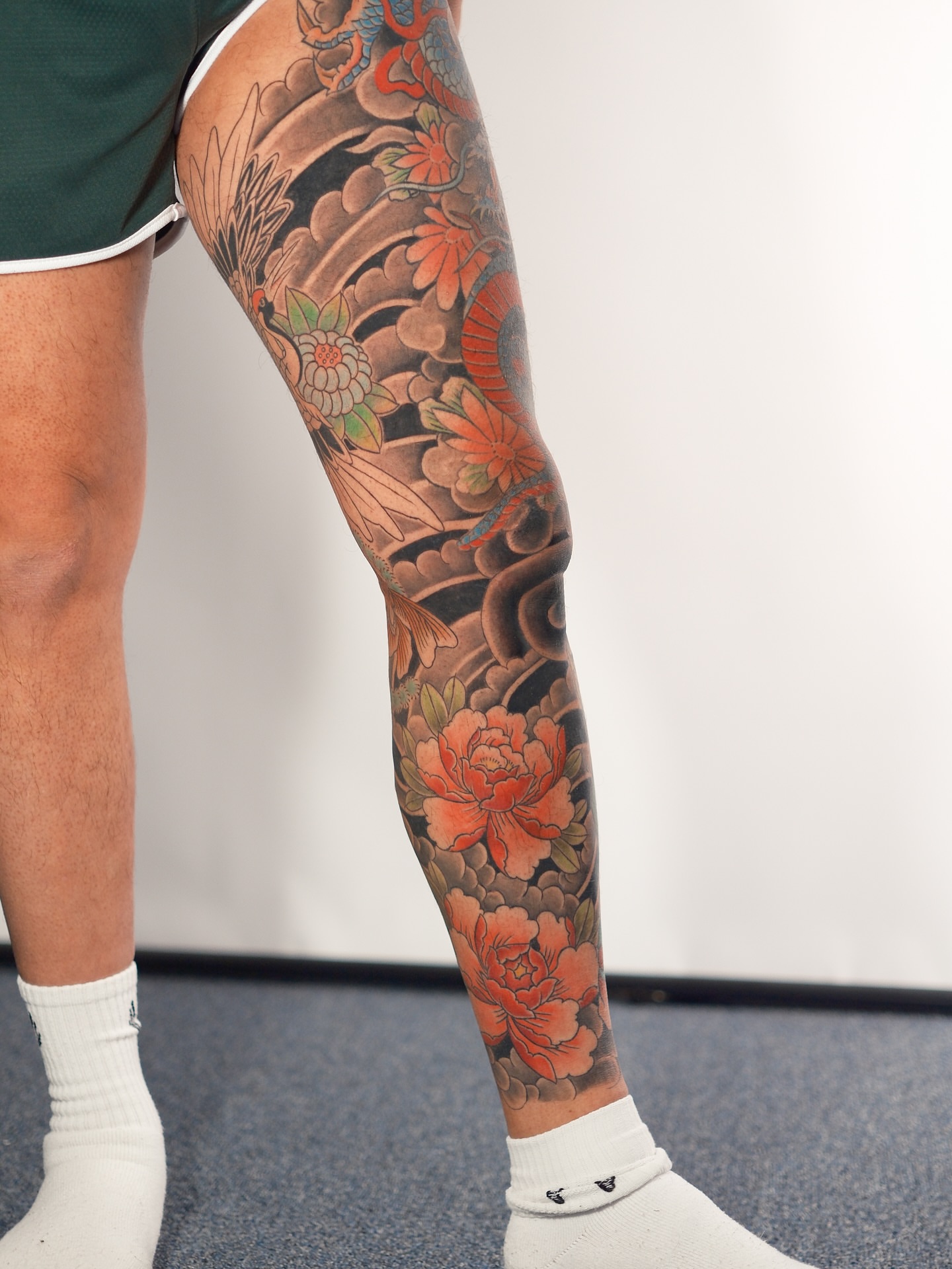 Peony flowers japanese irezumi tattoo on the calf by Tattoo Artist Los Angeles