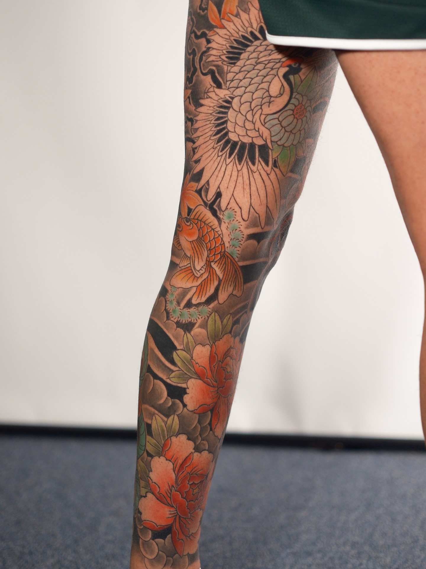 Koi fish and crane japanese irezumi tattoo on the leg by Tattoo Artist Los Angeles