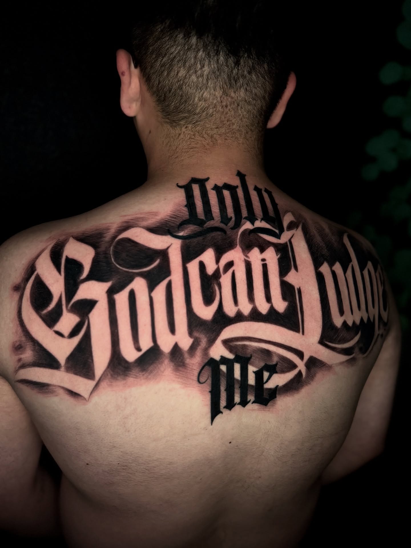 Only God Can Judge Me lettering script tattoo on the back by Angelo Buonanno, Las Vegas, Nevada