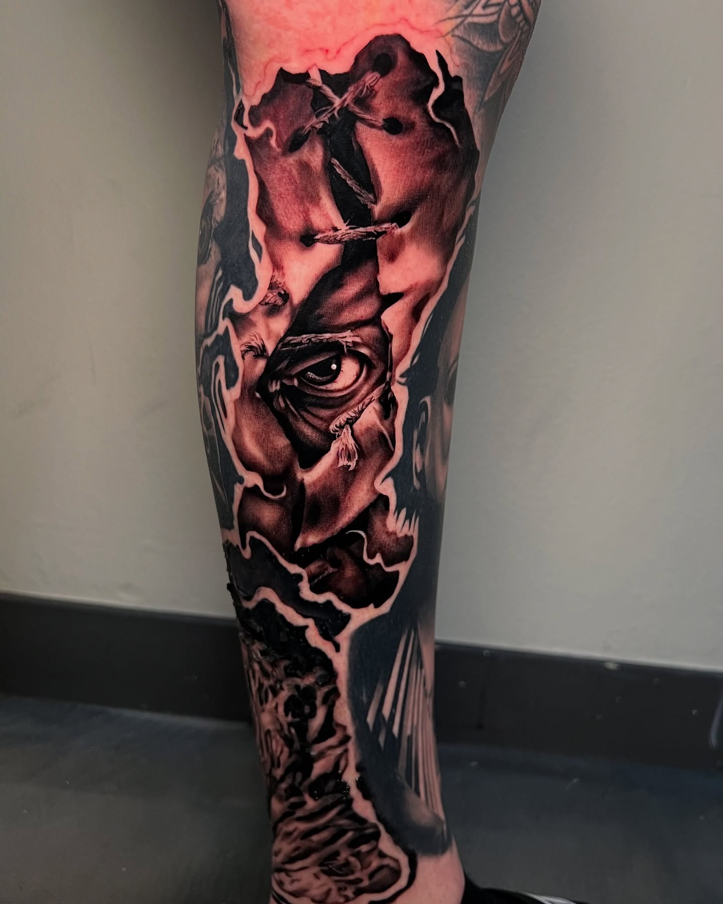 Eye realism tattoo on the calf by James Foltz