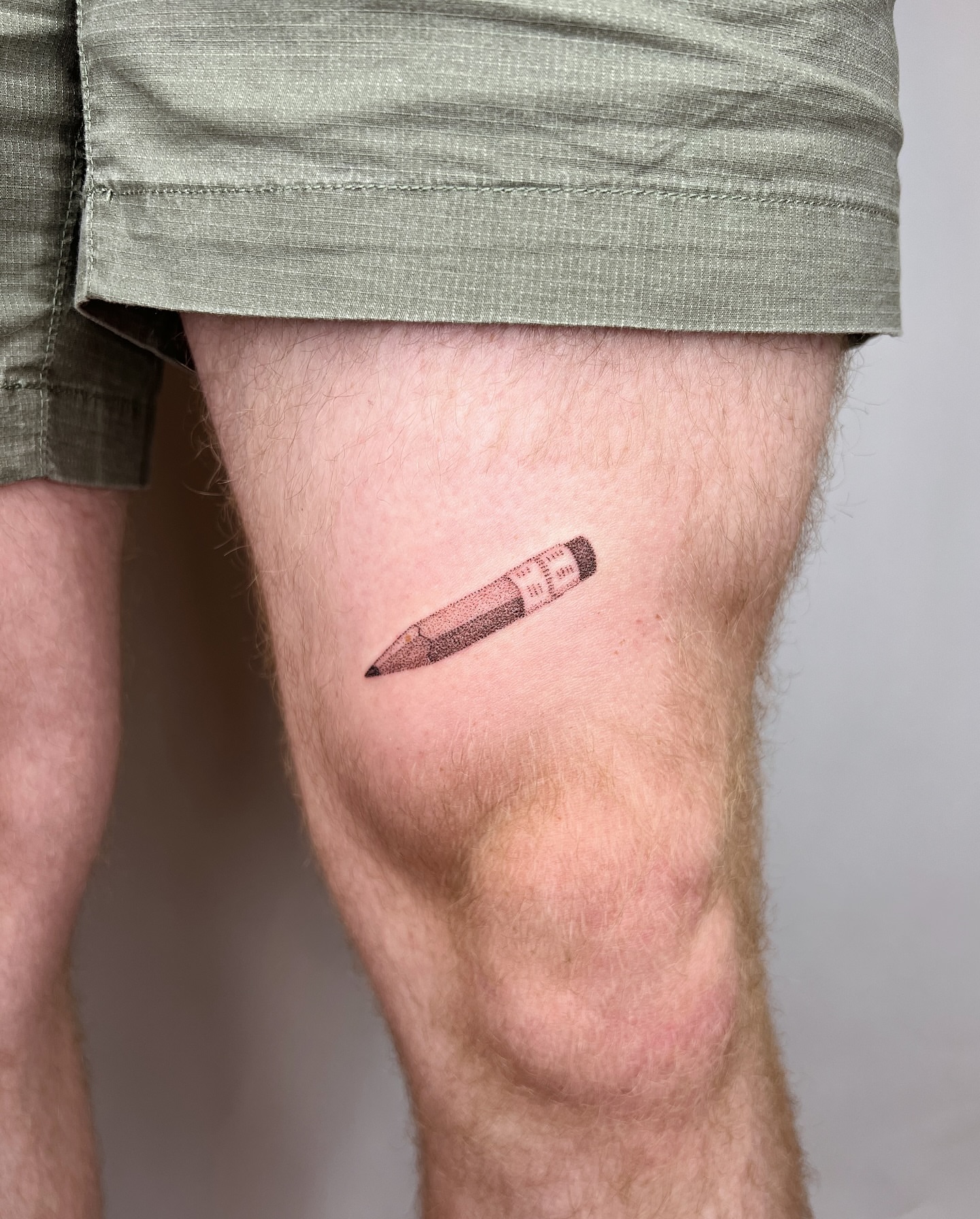 Pencil black and grey tattoo on the thigh by kait ❃ hartman