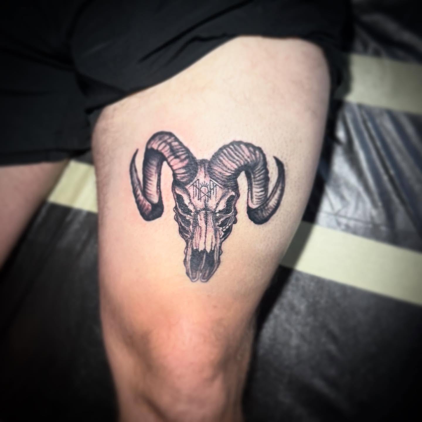 Ram skull realism tattoo on the thigh by AaronAdlerTattoos.com, Cincinnati