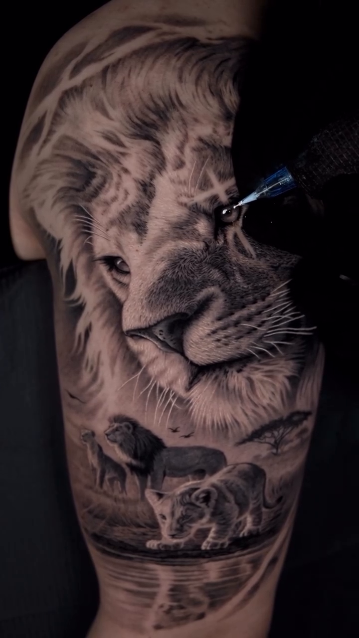 Lion and cubs in savanna realism tattoo by Jesus Alonso