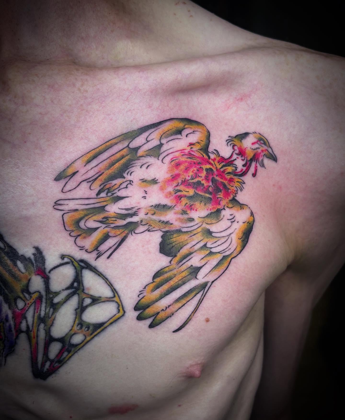 Bird neo-traditional tattoo on the chest by Tad Fulkerson, San Francisco, California