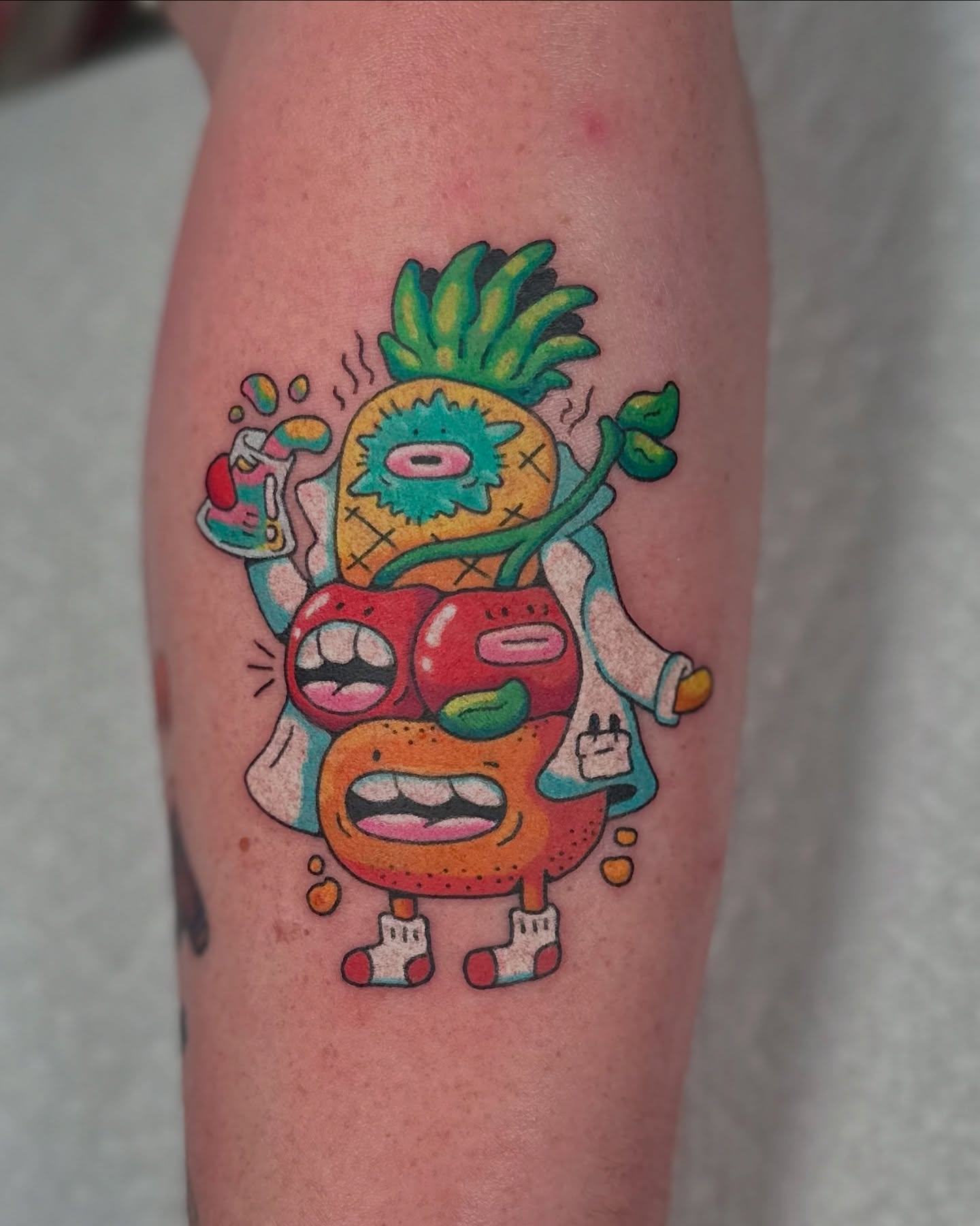 Monster new school tattoo on the thigh by Kellie Burch