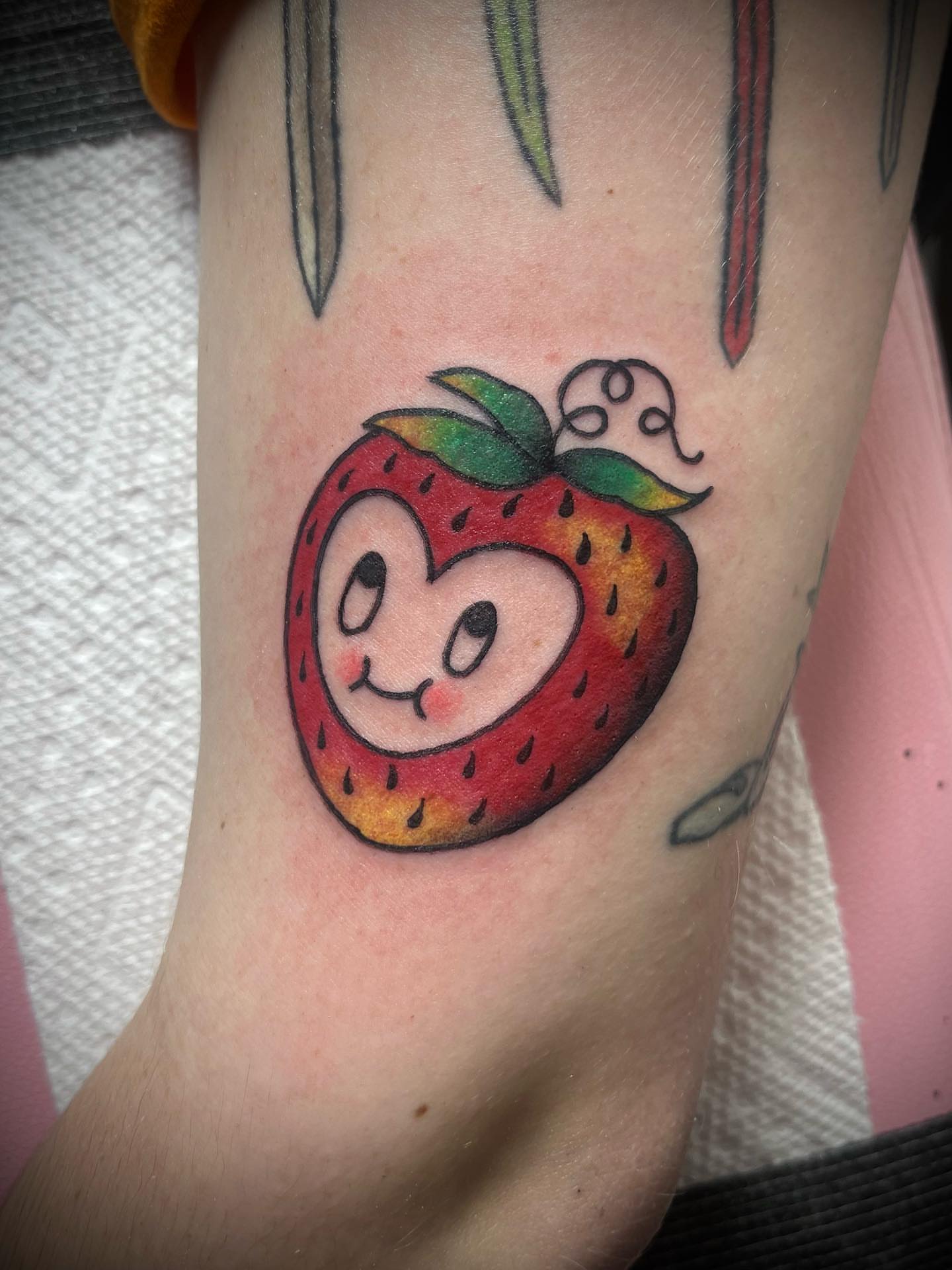 Strawberry dotwork tattoo on the forearm by Andrea