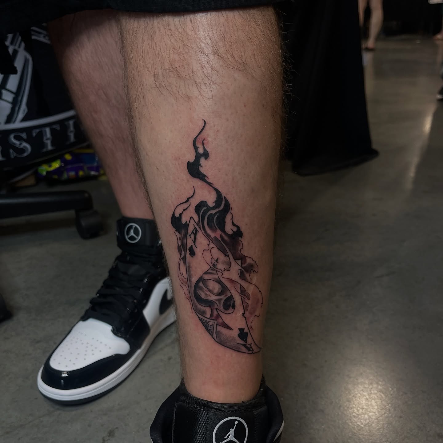 Flaming skull realism tattoo on the calf by MoogieTats