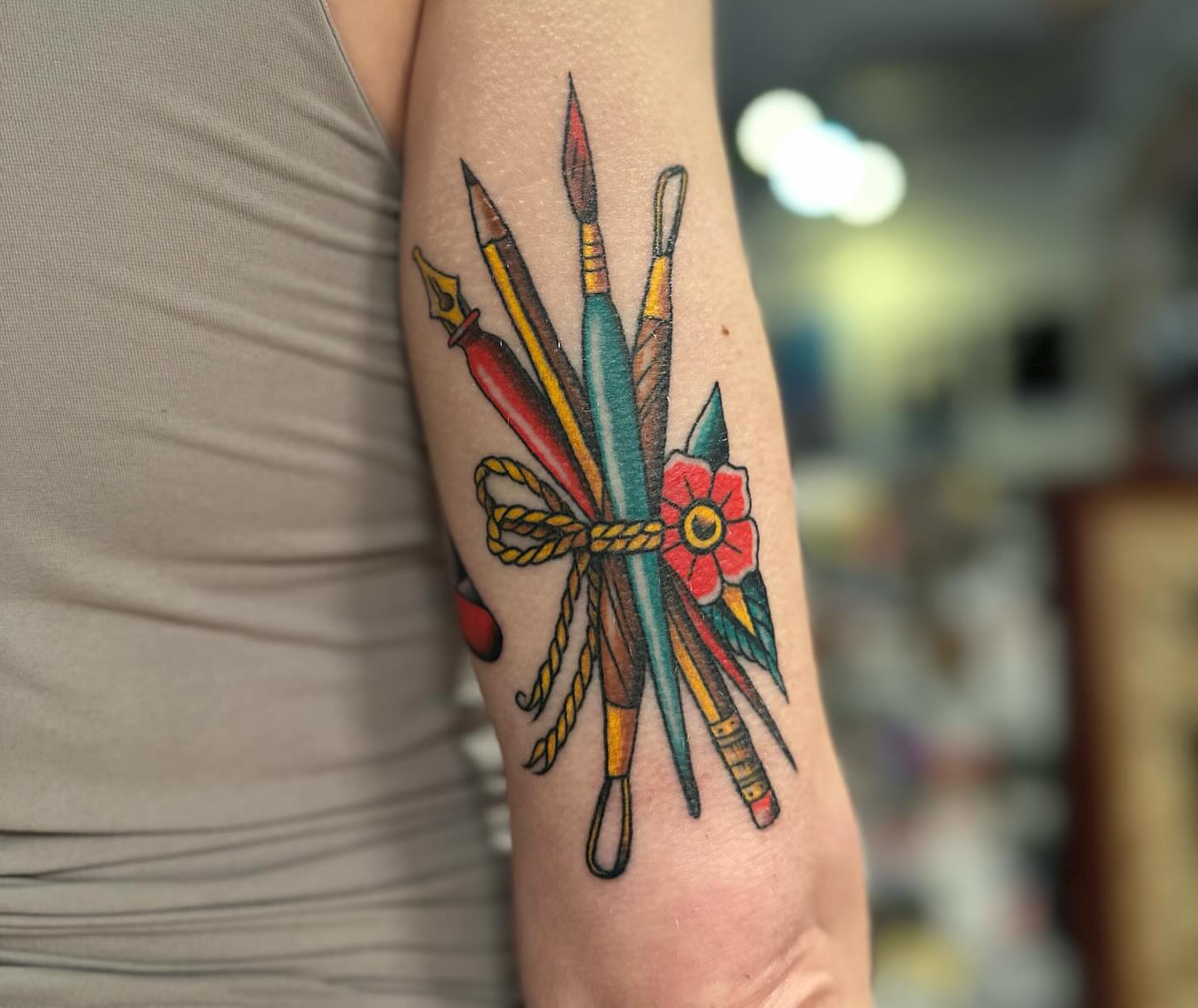Art supplies American traditional tattoo on the forearm by Stacy Fevinger