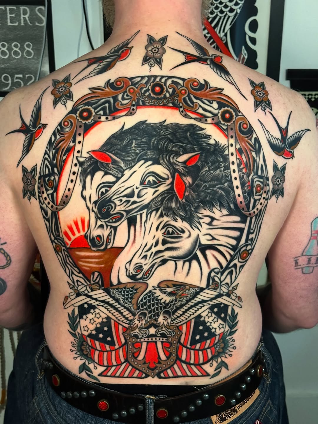 Horses, eagle, and american flag ignorant tattoo on the back by A.j. Lingerfeldt, Nashville, Tennessee