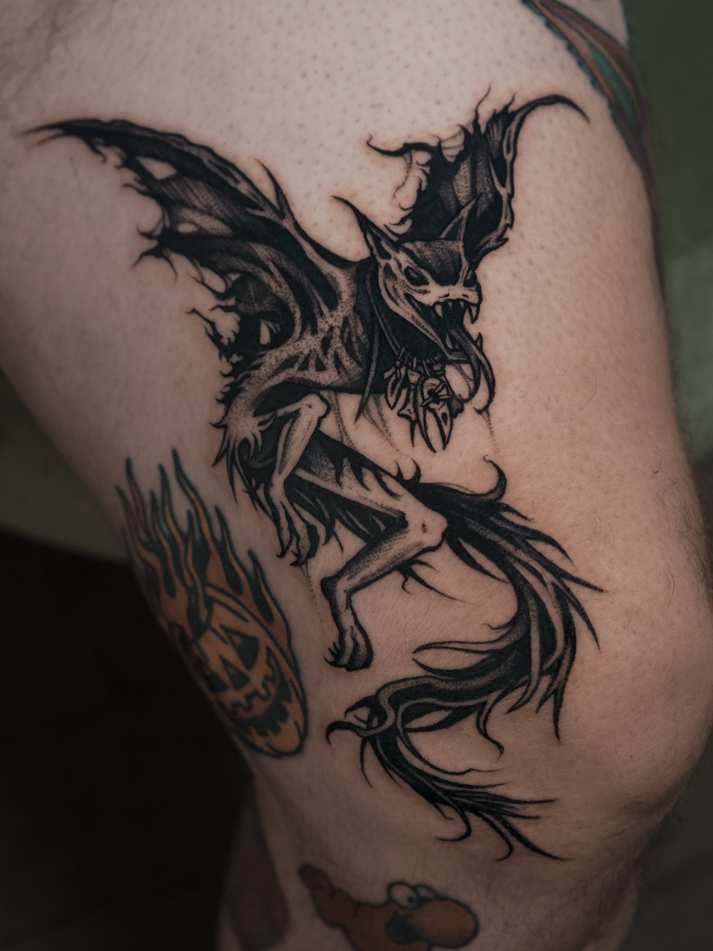 Demon horse black and grey tattoo on the thigh by Bruna Bianculli