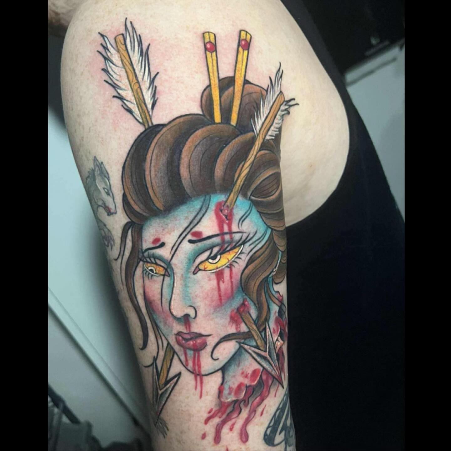 Geisha with arrows American traditional tattoo on the shoulder by BodyArtByAlia