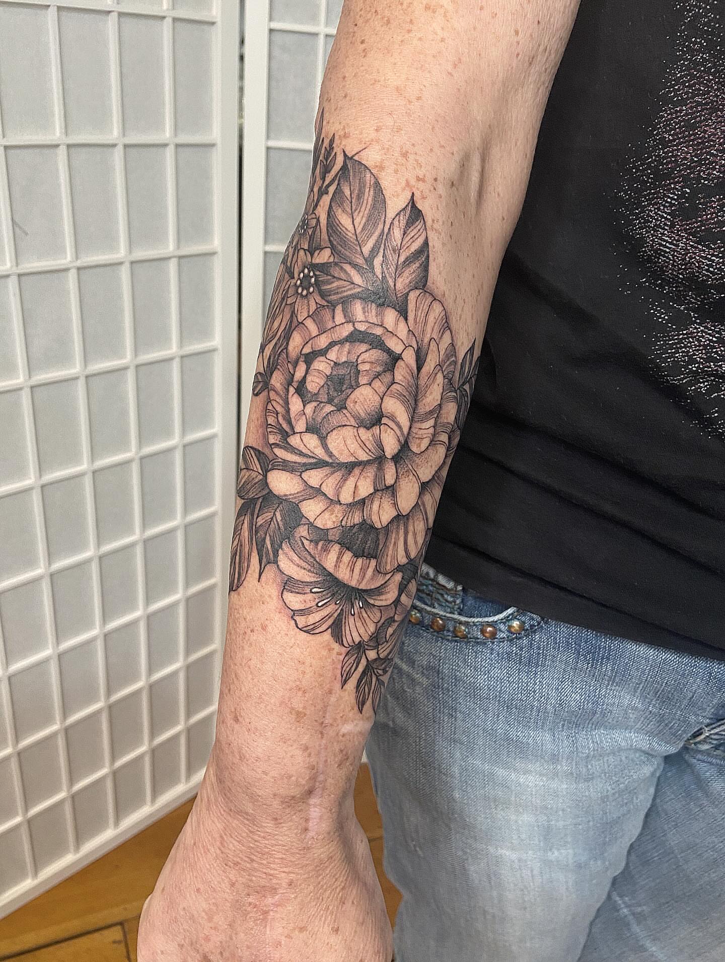 Peony black and grey tattoo on the forearm by Tattoos by Dale Hupke, Lebanon, Ohio