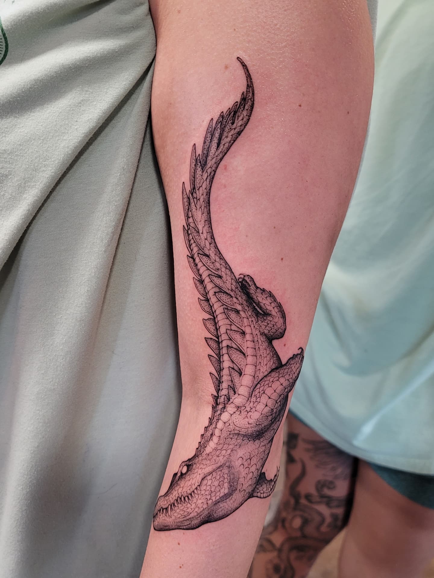 Alligator black and grey tattoo on the forearm by Keith Countryman, Fort Worth, Texas