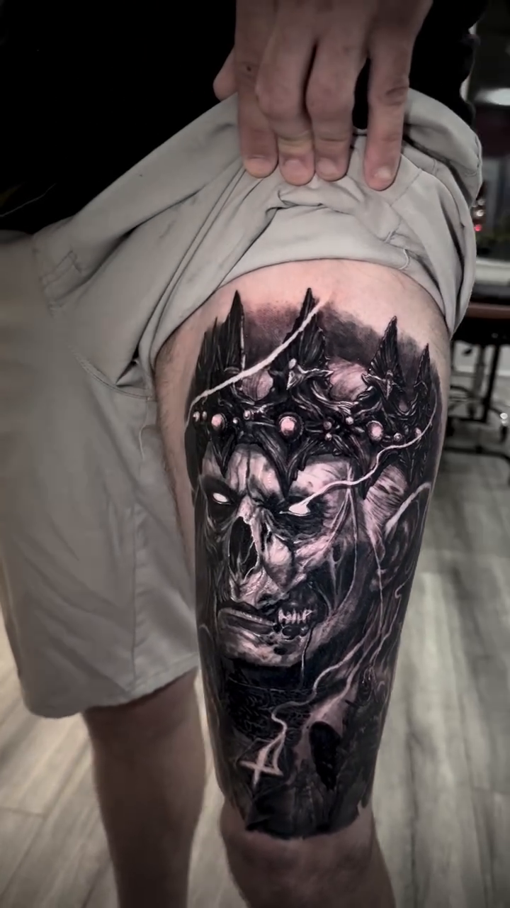 Skull with crown dark realism tattoo by Chuck James, Roseville, California
